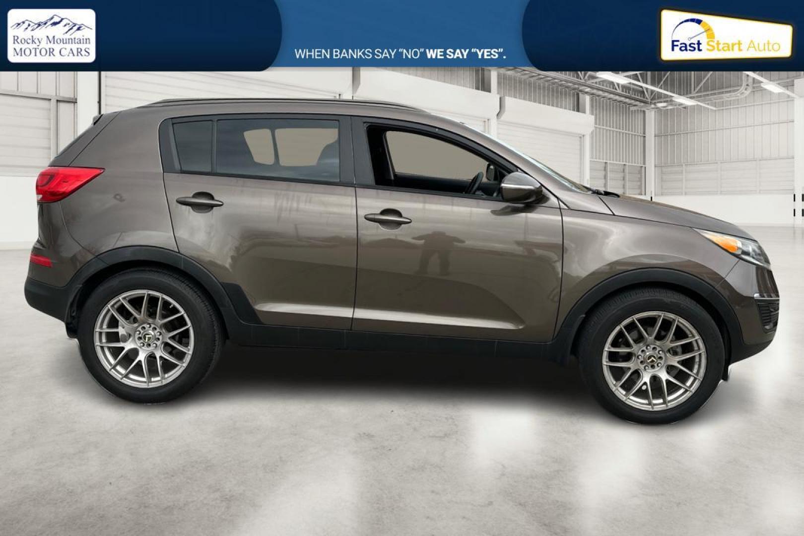 2014 Brown Kia Sportage LX FWD (KNDPB3AC6E7) with an 2.4L V6 DOHC 24V engine, 6-Speed Automatic transmission, located at 7755 State Street, Midvale, UT, 84047, (801) 753-9063, 40.610329, -111.892159 - Photo#1