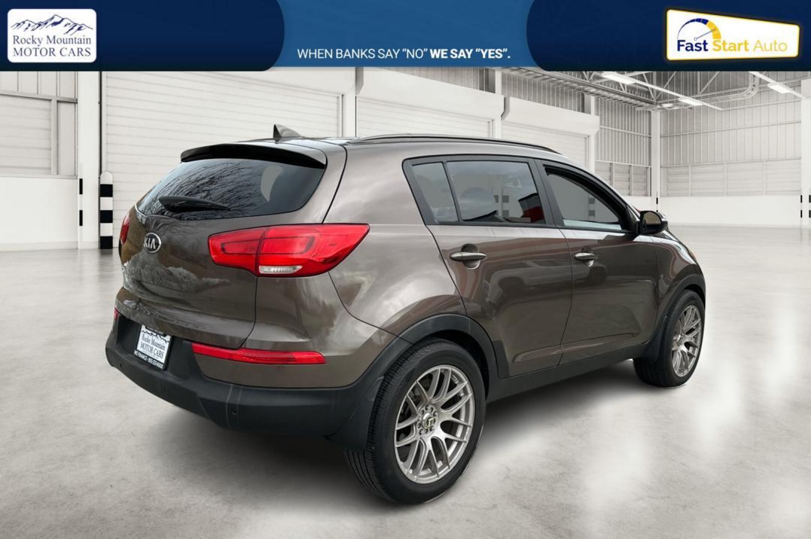 2014 Brown Kia Sportage LX FWD (KNDPB3AC6E7) with an 2.4L V6 DOHC 24V engine, 6-Speed Automatic transmission, located at 7755 State Street, Midvale, UT, 84047, (801) 753-9063, 40.610329, -111.892159 - Photo#2