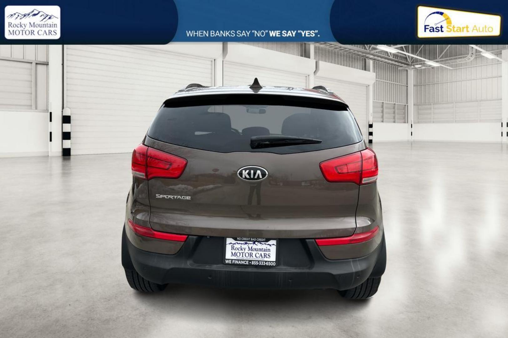 2014 Brown Kia Sportage LX FWD (KNDPB3AC6E7) with an 2.4L V6 DOHC 24V engine, 6-Speed Automatic transmission, located at 7755 State Street, Midvale, UT, 84047, (801) 753-9063, 40.610329, -111.892159 - Photo#4