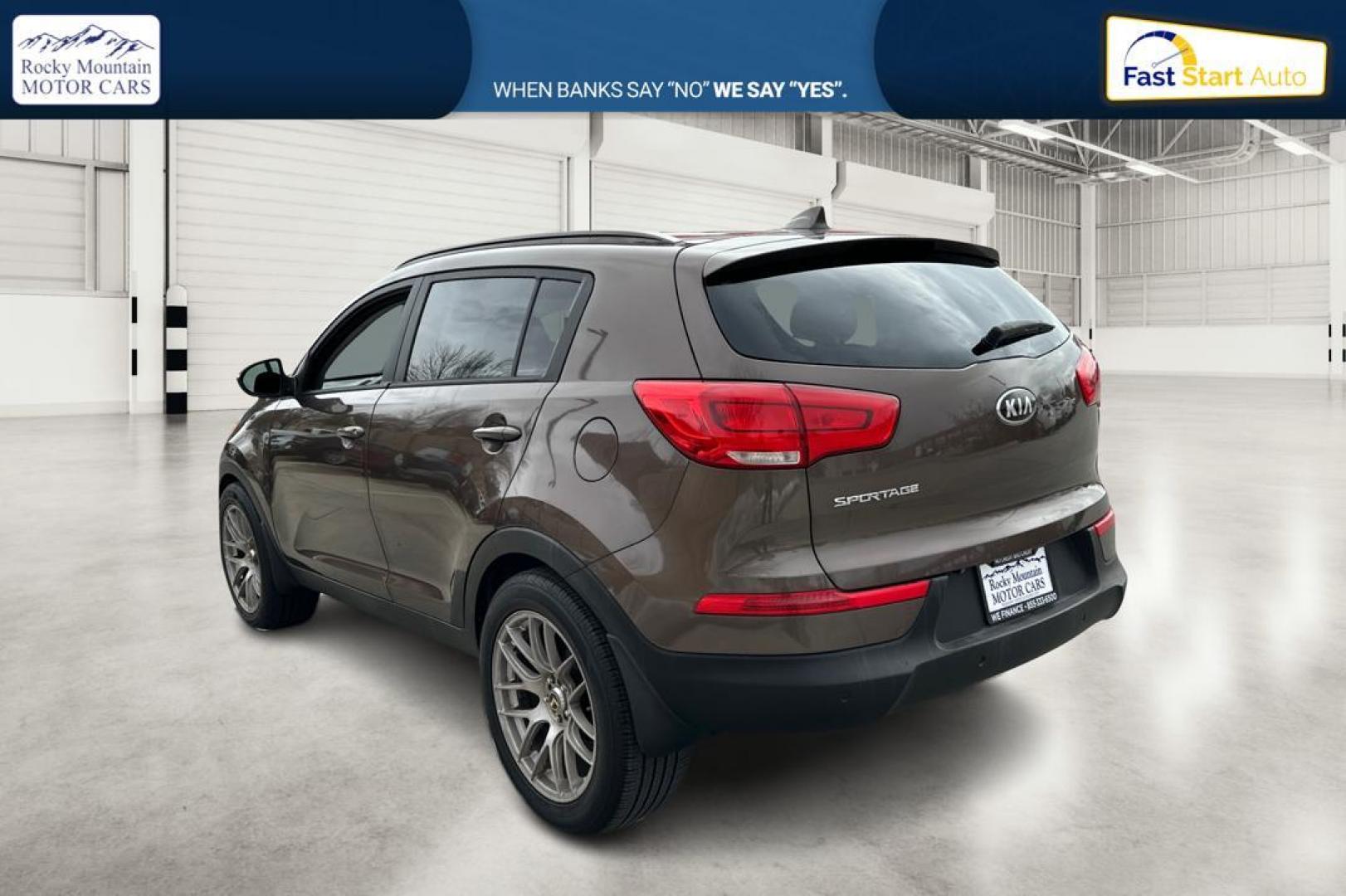 2014 Brown Kia Sportage LX FWD (KNDPB3AC6E7) with an 2.4L V6 DOHC 24V engine, 6-Speed Automatic transmission, located at 7755 State Street, Midvale, UT, 84047, (801) 753-9063, 40.610329, -111.892159 - Photo#5