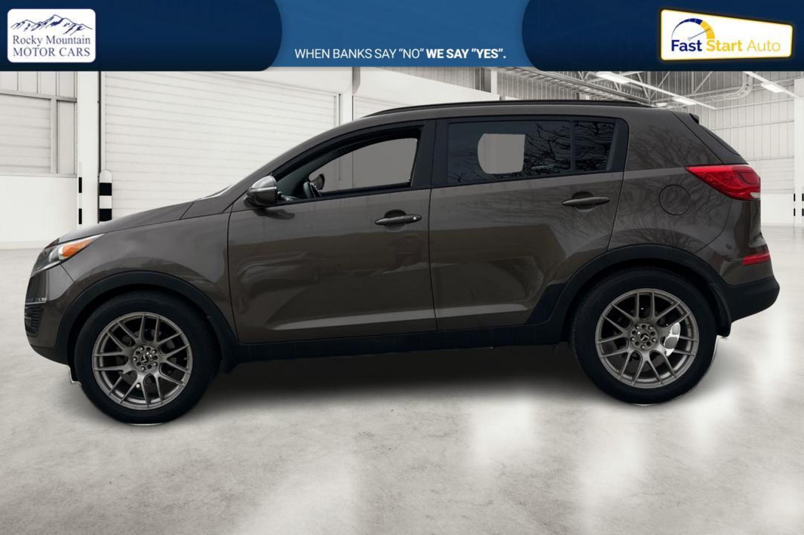 2014 Brown Kia Sportage LX FWD (KNDPB3AC6E7) with an 2.4L V6 DOHC 24V engine, 6-Speed Automatic transmission, located at 7755 State Street, Midvale, UT, 84047, (801) 753-9063, 40.610329, -111.892159 - Photo#6