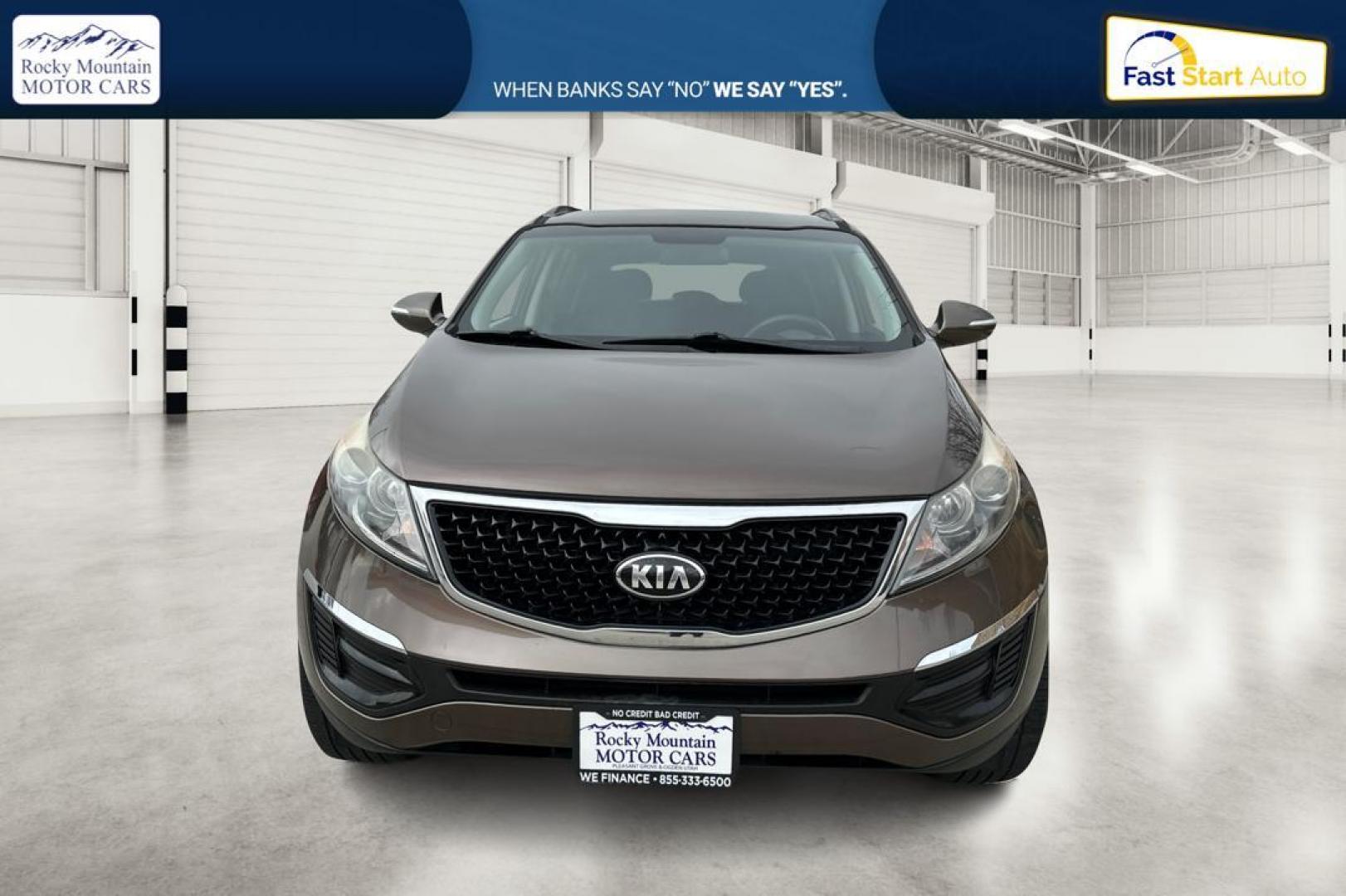 2014 Brown Kia Sportage LX FWD (KNDPB3AC6E7) with an 2.4L V6 DOHC 24V engine, 6-Speed Automatic transmission, located at 7755 State Street, Midvale, UT, 84047, (801) 753-9063, 40.610329, -111.892159 - Photo#9