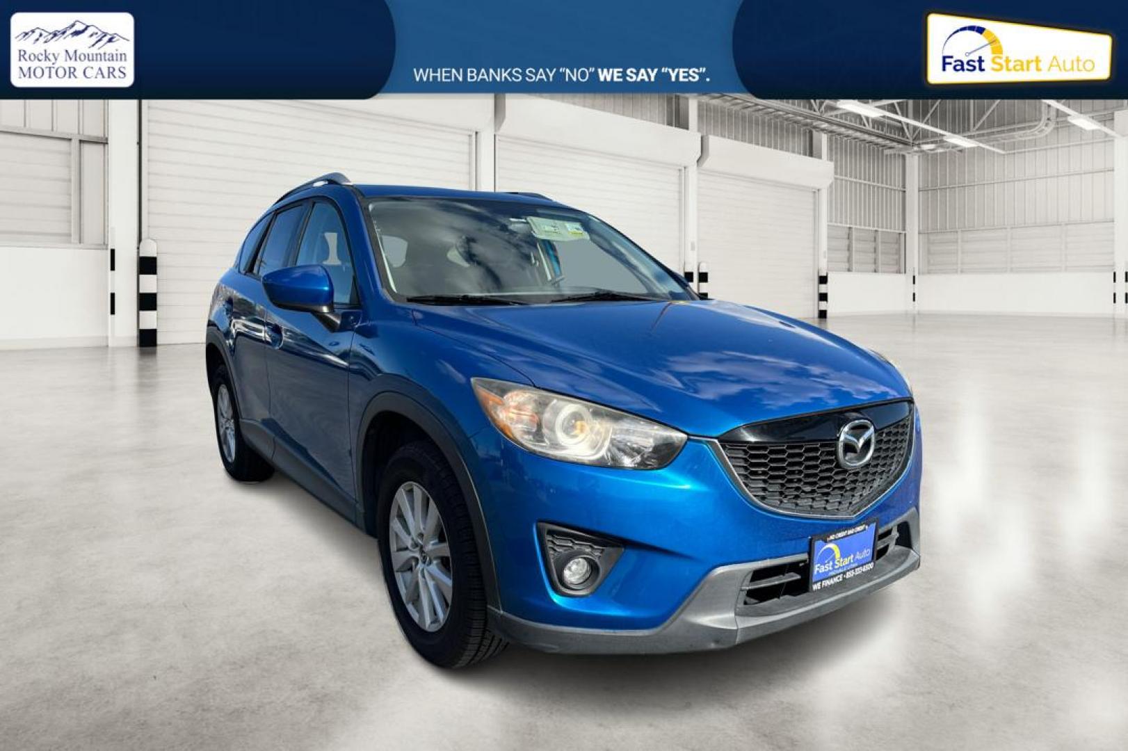 2014 Blue Mazda CX-5 Touring (JM3KE2CY1E0) with an 2.5L L4 DOHC 16V engine, 6-Speed Automatic transmission, located at 7755 State Street, Midvale, UT, 84047, (801) 753-9063, 40.610329, -111.892159 - Photo#0