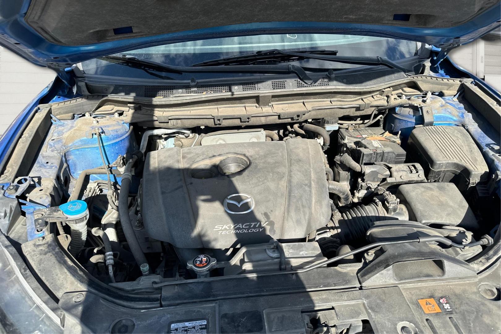 2014 Blue Mazda CX-5 Touring (JM3KE2CY1E0) with an 2.5L L4 DOHC 16V engine, 6-Speed Automatic transmission, located at 7755 State Street, Midvale, UT, 84047, (801) 753-9063, 40.610329, -111.892159 - Photo#10