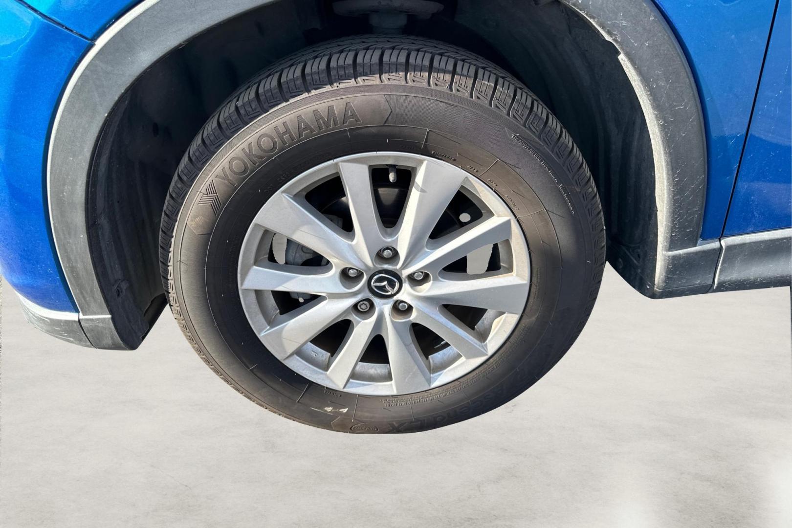 2014 Blue Mazda CX-5 Touring (JM3KE2CY1E0) with an 2.5L L4 DOHC 16V engine, 6-Speed Automatic transmission, located at 7755 State Street, Midvale, UT, 84047, (801) 753-9063, 40.610329, -111.892159 - Photo#12