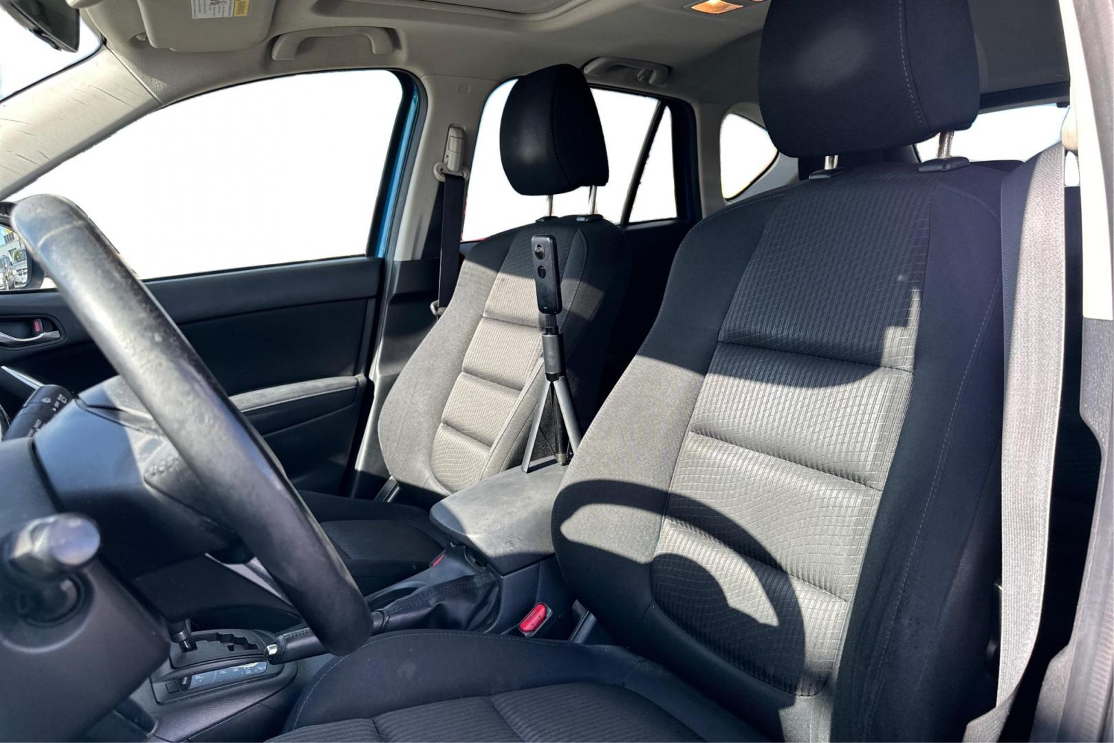 2014 Blue Mazda CX-5 Touring (JM3KE2CY1E0) with an 2.5L L4 DOHC 16V engine, 6-Speed Automatic transmission, located at 7755 State Street, Midvale, UT, 84047, (801) 753-9063, 40.610329, -111.892159 - Photo#13