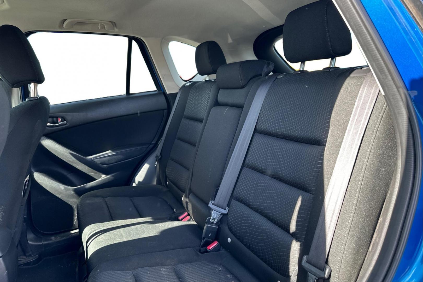 2014 Blue Mazda CX-5 Touring (JM3KE2CY1E0) with an 2.5L L4 DOHC 16V engine, 6-Speed Automatic transmission, located at 7755 State Street, Midvale, UT, 84047, (801) 753-9063, 40.610329, -111.892159 - Photo#14