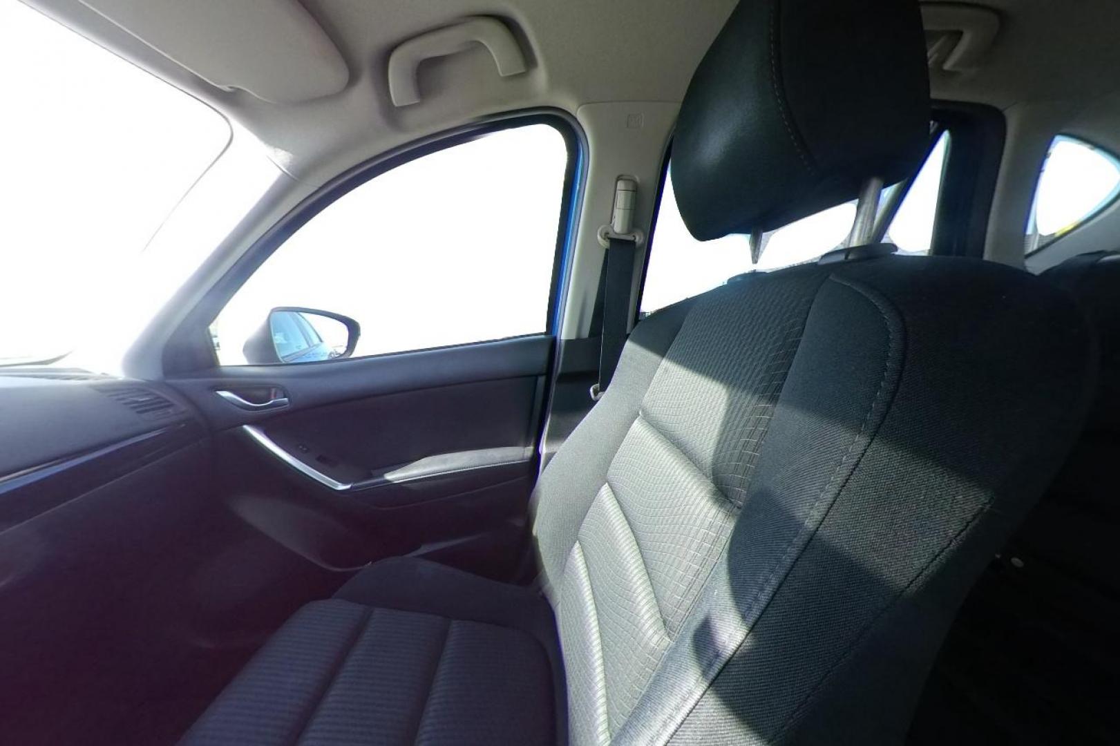 2014 Blue Mazda CX-5 Touring (JM3KE2CY1E0) with an 2.5L L4 DOHC 16V engine, 6-Speed Automatic transmission, located at 7755 State Street, Midvale, UT, 84047, (801) 753-9063, 40.610329, -111.892159 - Photo#16