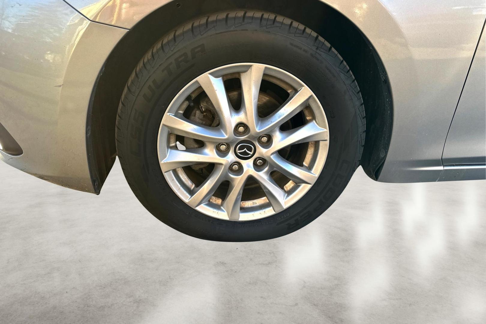 2014 Silver Mazda MAZDA3 i Grand Touring AT 4-Door (JM1BM1W76E1) with an 2.0L L4 DOHC 16V engine, 6-Speed Automatic transmission, located at 7755 State Street, Midvale, UT, 84047, (801) 753-9063, 40.610329, -111.892159 - Photo#9