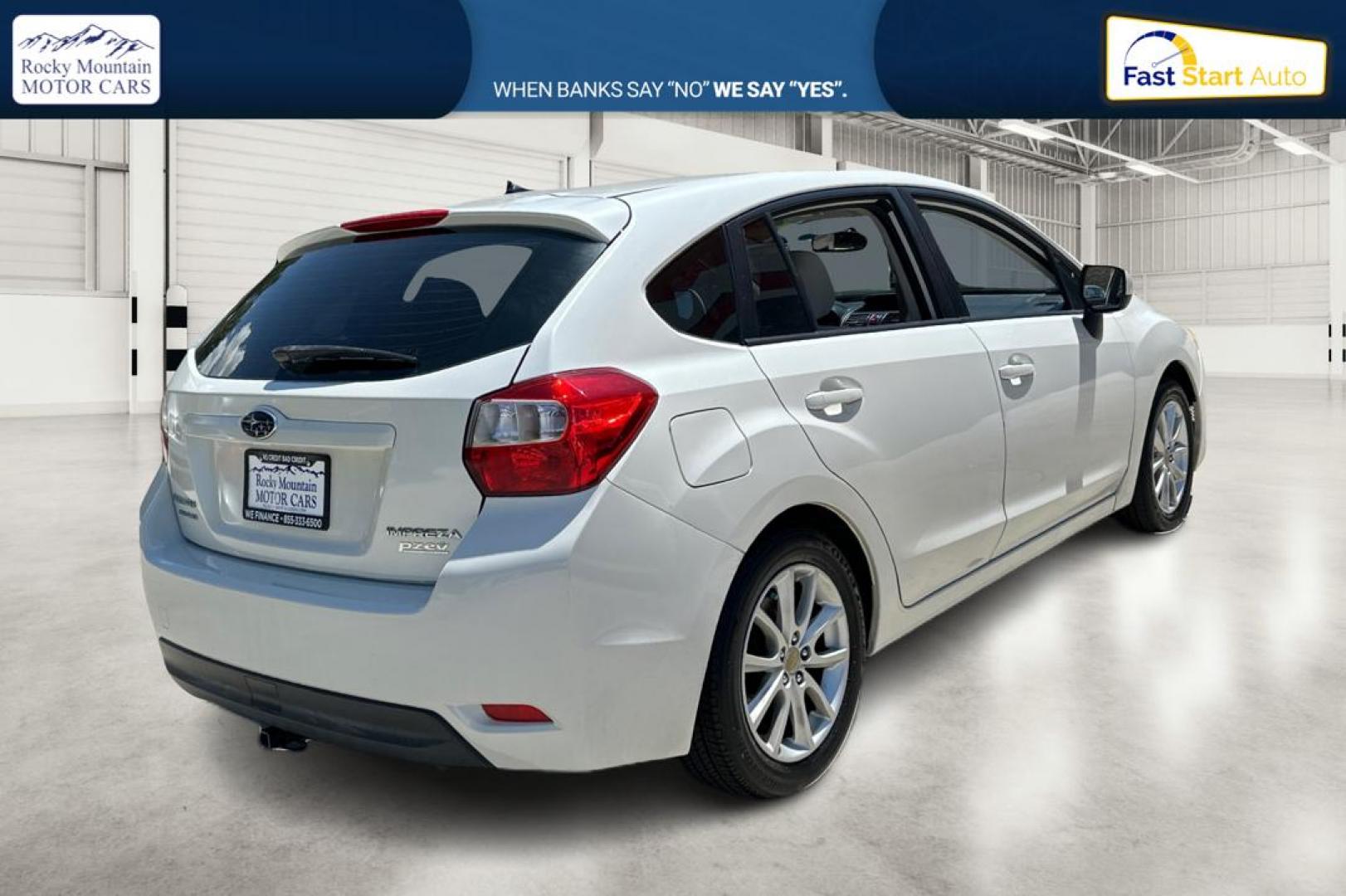 2014 White Subaru Impreza 2.0i Premium 5-Door w/All Weather Package (JF1GPAC66EH) with an 2.0L H4 DOHC 16V engine, Continuously Variable Transmission transmission, located at 767 S State Road, Pleasant Grove, UT, 84062, (801) 785-1058, 40.354839, -111.736687 - Photo#2