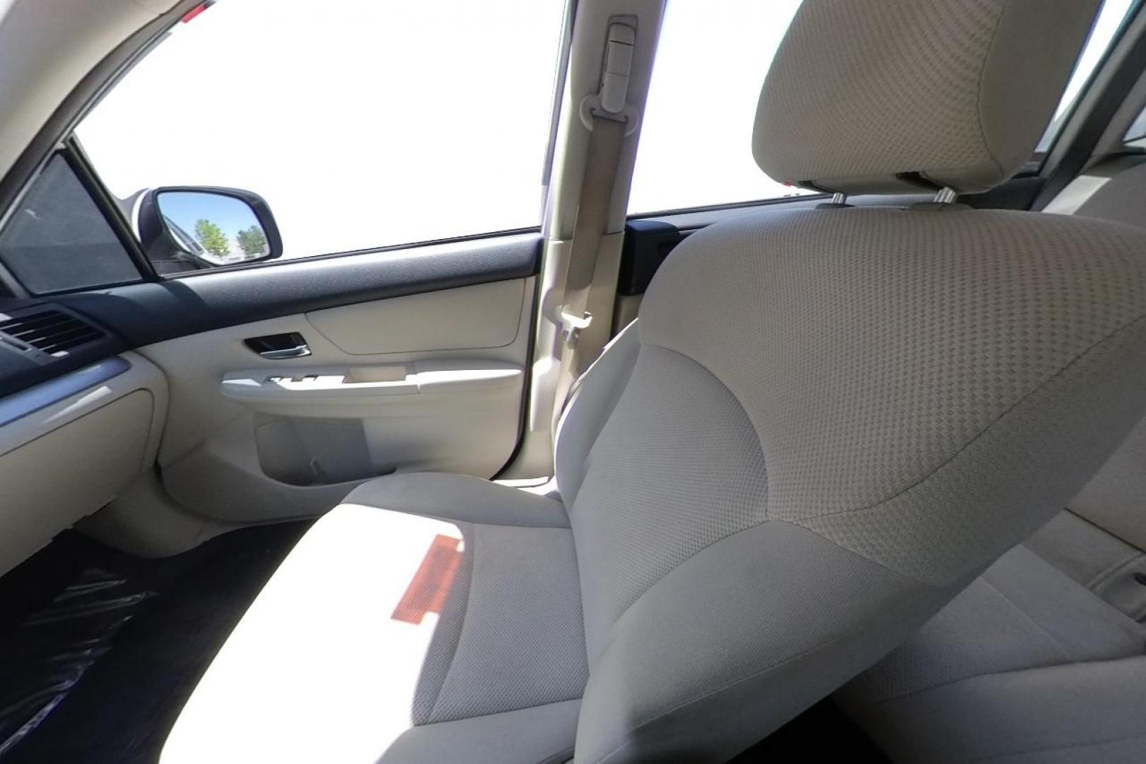 2014 White Subaru Impreza 2.0i Premium 5-Door w/All Weather Package (JF1GPAC66EH) with an 2.0L H4 DOHC 16V engine, Continuously Variable Transmission transmission, located at 767 S State Road, Pleasant Grove, UT, 84062, (801) 785-1058, 40.354839, -111.736687 - Photo#15