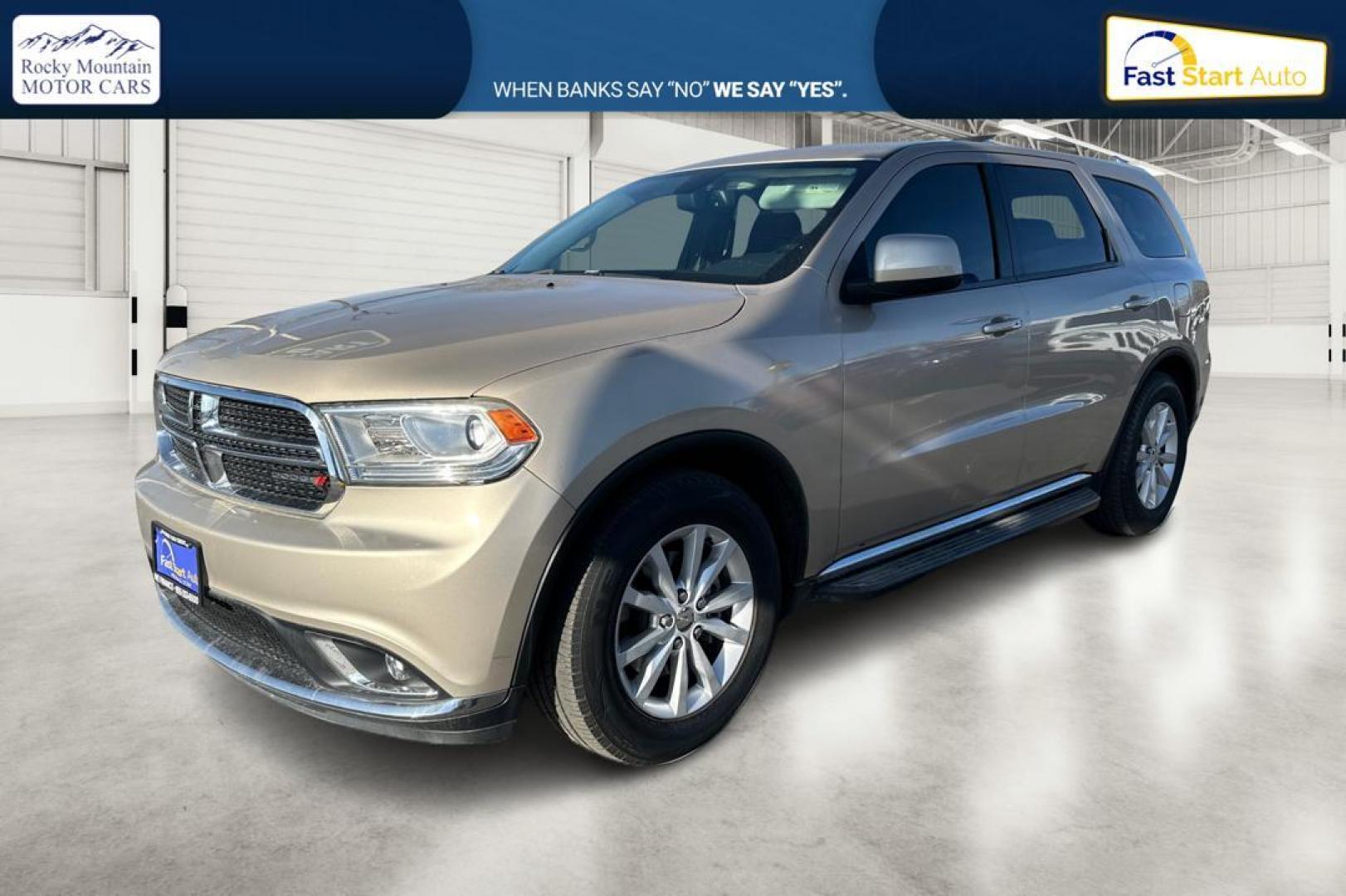 2015 Gold Dodge Durango SXT RWD (1C4RDHAG4FC) with an 3.6L V6 DOHC 24V engine, 8-Speed Automatic transmission, located at 7755 State Street, Midvale, UT, 84047, (801) 753-9063, 40.610329, -111.892159 - Photo#8