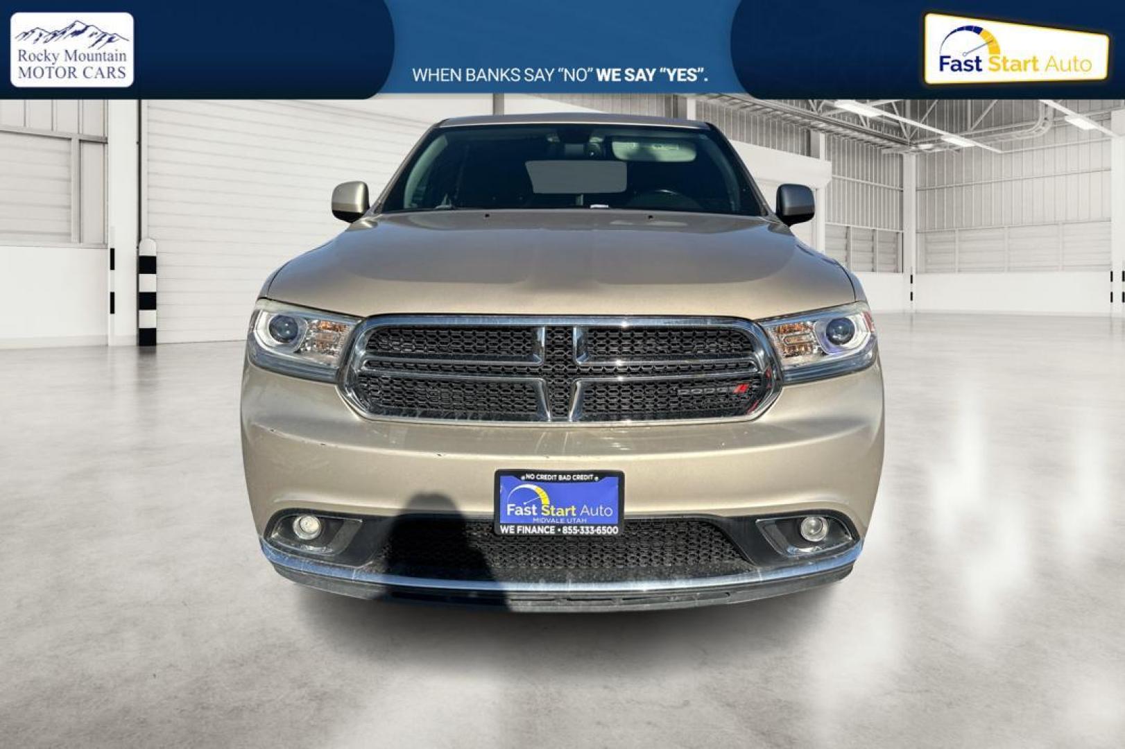 2015 Gold Dodge Durango SXT RWD (1C4RDHAG4FC) with an 3.6L V6 DOHC 24V engine, 8-Speed Automatic transmission, located at 7755 State Street, Midvale, UT, 84047, (801) 753-9063, 40.610329, -111.892159 - Photo#9