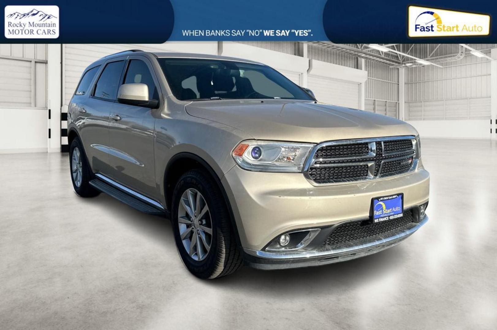 2015 Gold Dodge Durango SXT RWD (1C4RDHAG4FC) with an 3.6L V6 DOHC 24V engine, 8-Speed Automatic transmission, located at 7755 State Street, Midvale, UT, 84047, (801) 753-9063, 40.610329, -111.892159 - Photo#0