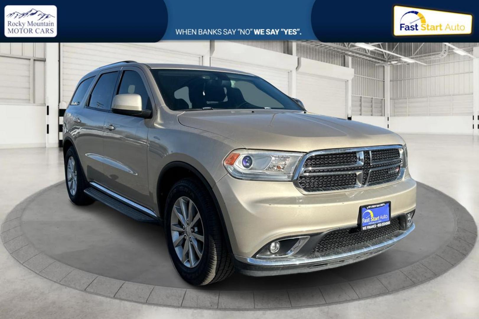 2015 Gold Dodge Durango SXT RWD (1C4RDHAG4FC) with an 3.6L V6 DOHC 24V engine, 8-Speed Automatic transmission, located at 7755 State Street, Midvale, UT, 84047, (801) 753-9063, 40.610329, -111.892159 - Photo#0