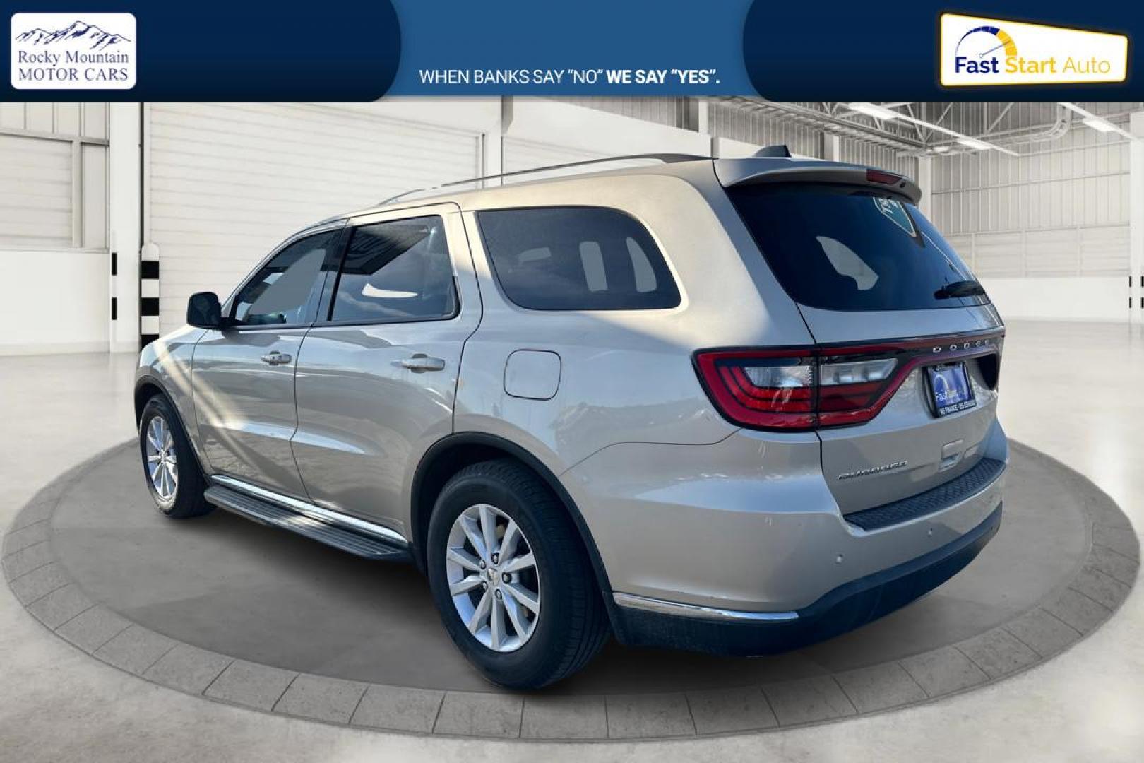 2015 Gold Dodge Durango SXT RWD (1C4RDHAG4FC) with an 3.6L V6 DOHC 24V engine, 8-Speed Automatic transmission, located at 7755 State Street, Midvale, UT, 84047, (801) 753-9063, 40.610329, -111.892159 - Photo#4