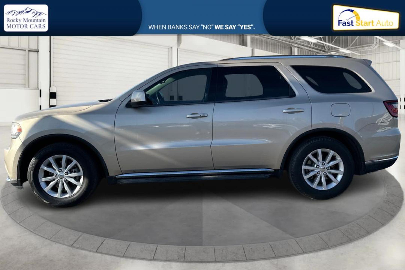 2015 Gold Dodge Durango SXT RWD (1C4RDHAG4FC) with an 3.6L V6 DOHC 24V engine, 8-Speed Automatic transmission, located at 7755 State Street, Midvale, UT, 84047, (801) 753-9063, 40.610329, -111.892159 - Photo#5