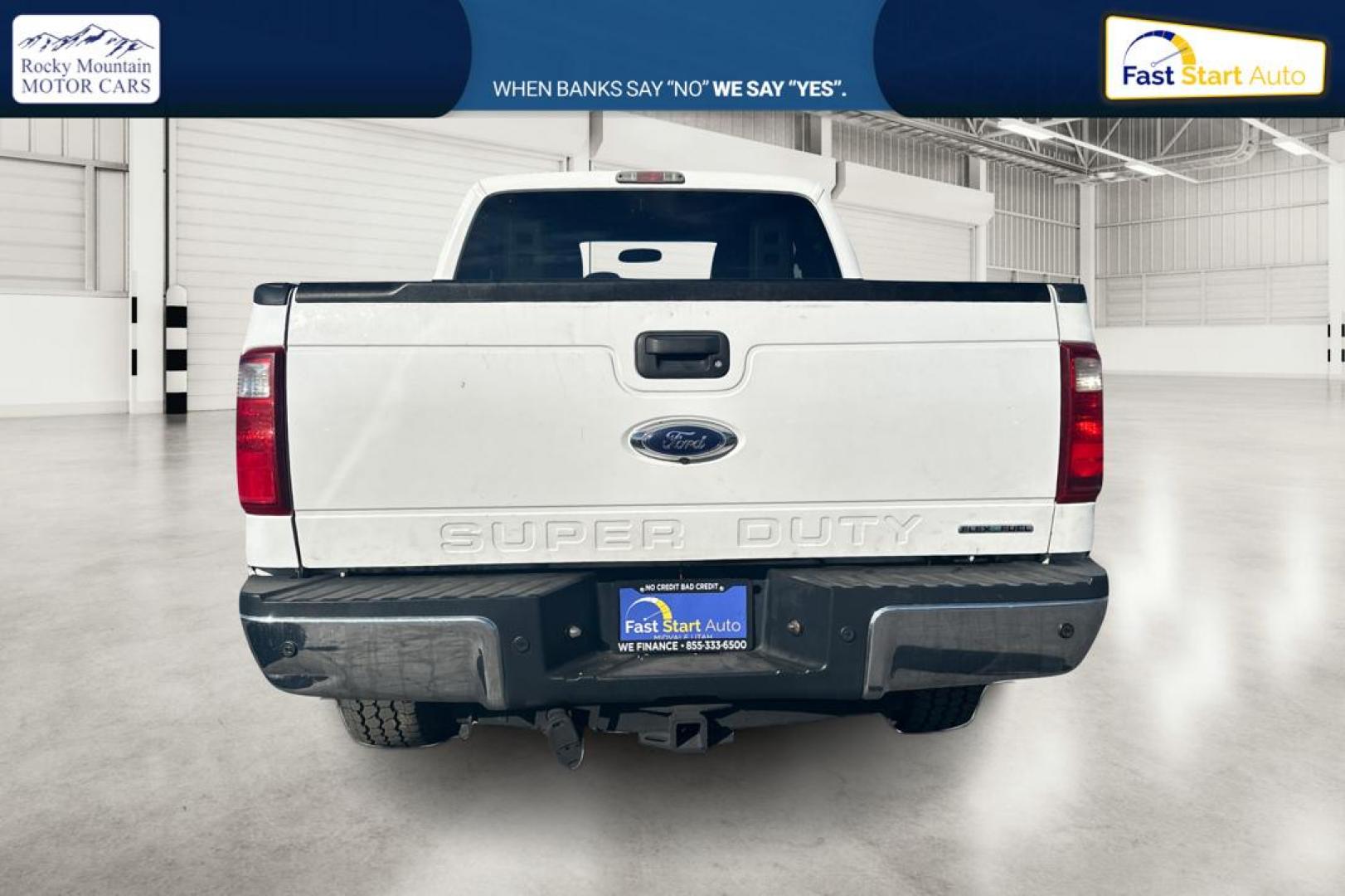2015 White Ford F-250 SD XLT SuperCab Long Bed 4WD (1FT7X2B68FE) with an 6.2L V8 OHV 16V engine, 6-Speed Automatic transmission, located at 767 S State Road, Pleasant Grove, UT, 84062, (801) 785-1058, 40.354839, -111.736687 - Photo#4
