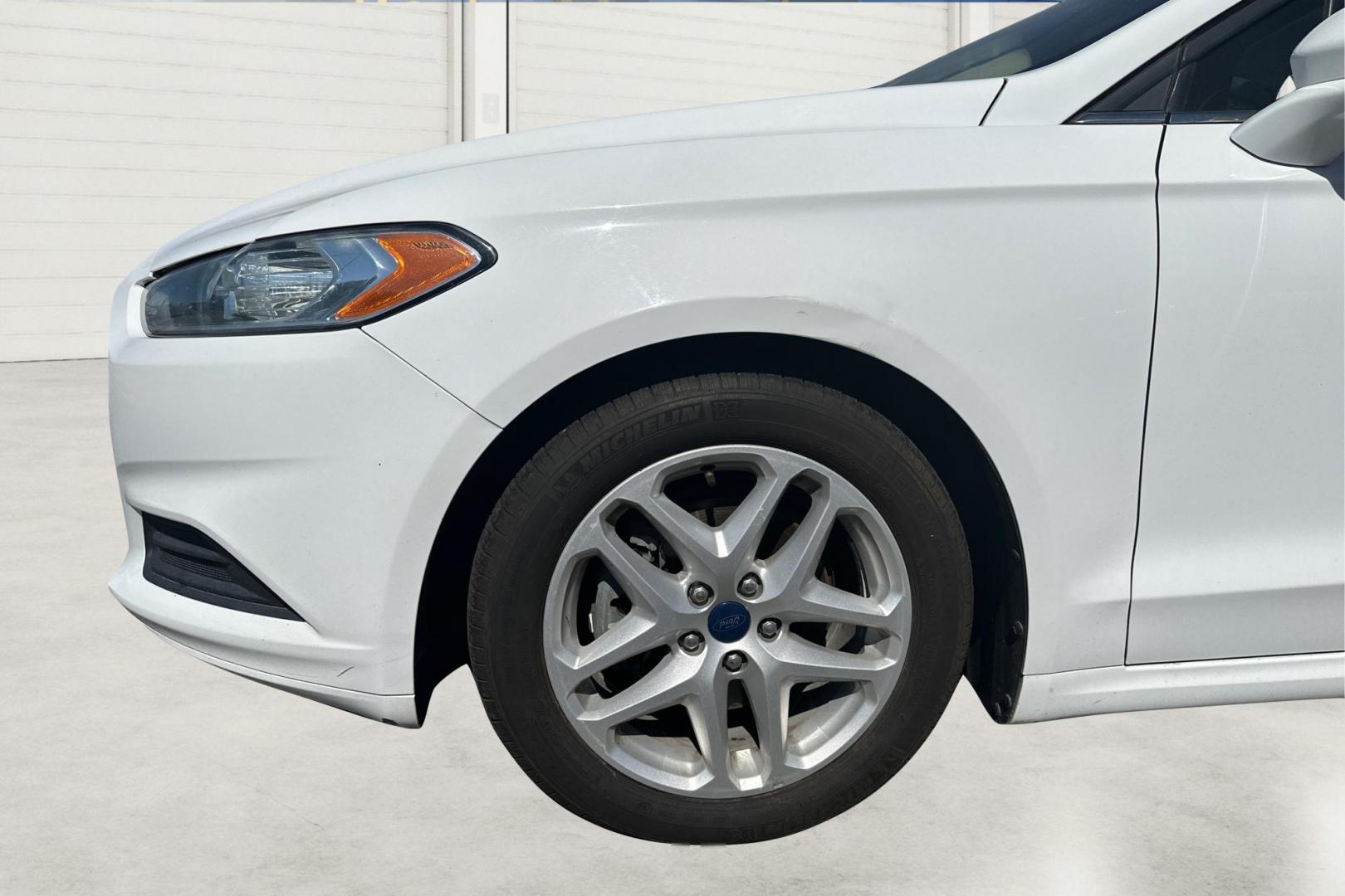 2015 White Ford Fusion SE (3FA6P0H71FR) with an 2.5L L4 DOHC 16V engine, Auto, 6-Spd w/SelShft transmission, located at 7755 State Street, Midvale, UT, 84047, (801) 753-9063, 40.610329, -111.892159 - Photo#12