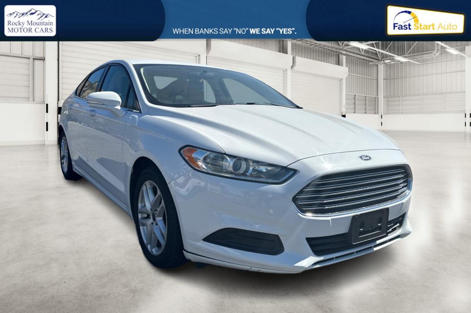 2015 White Ford Fusion SE (3FA6P0H71FR) with an 2.5L L4 DOHC 16V engine, Auto, 6-Spd w/SelShft transmission, located at 7755 State Street, Midvale, UT, 84047, (801) 753-9063, 40.610329, -111.892159 - Photo#0