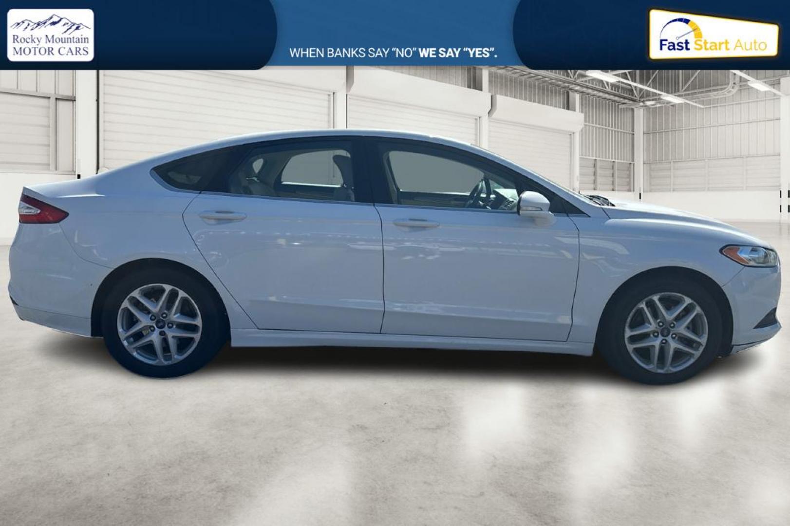 2015 White Ford Fusion SE (3FA6P0H71FR) with an 2.5L L4 DOHC 16V engine, Auto, 6-Spd w/SelShft transmission, located at 7755 State Street, Midvale, UT, 84047, (801) 753-9063, 40.610329, -111.892159 - Photo#1