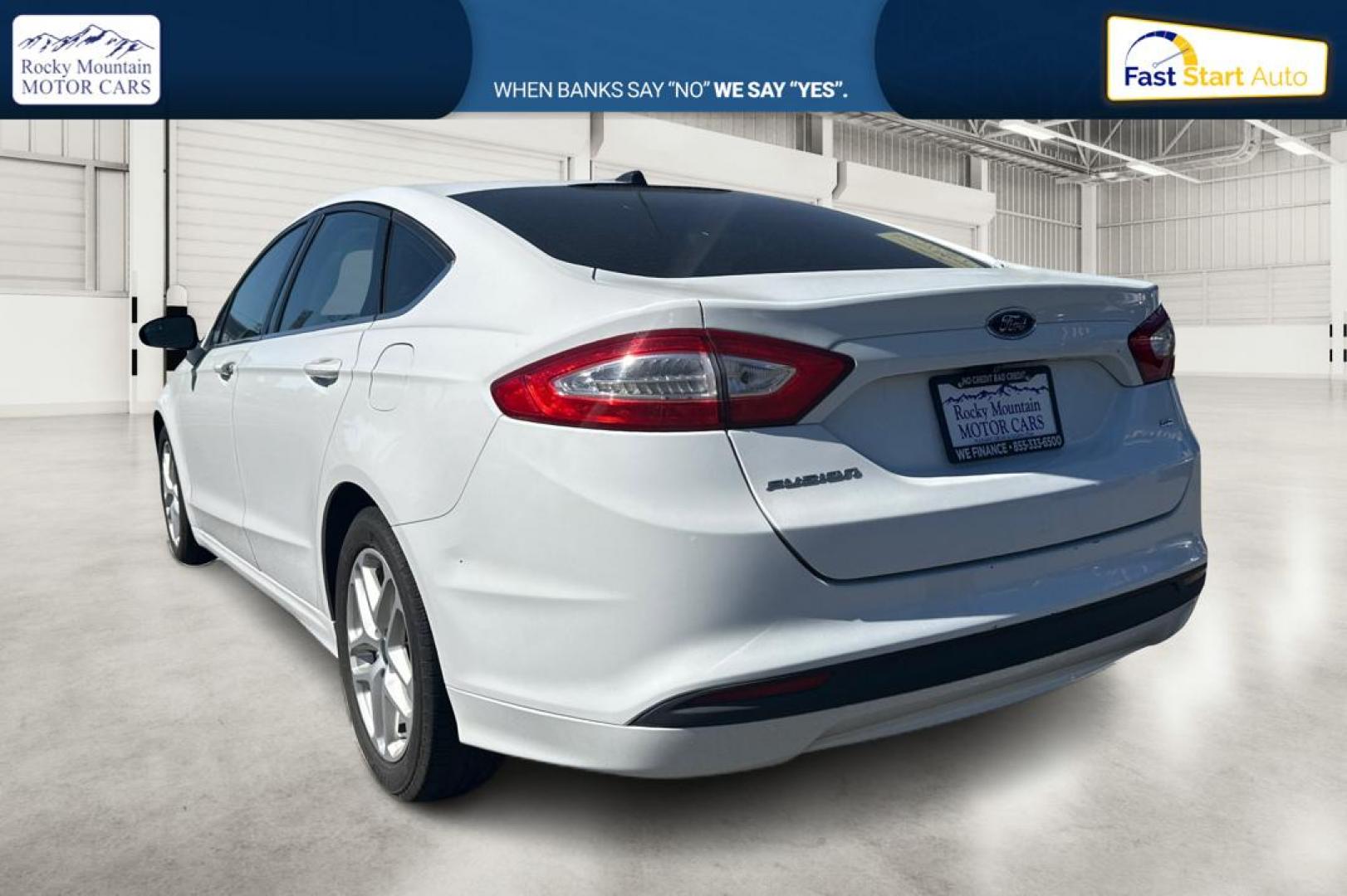 2015 White Ford Fusion SE (3FA6P0H71FR) with an 2.5L L4 DOHC 16V engine, Auto, 6-Spd w/SelShft transmission, located at 7755 State Street, Midvale, UT, 84047, (801) 753-9063, 40.610329, -111.892159 - Photo#5