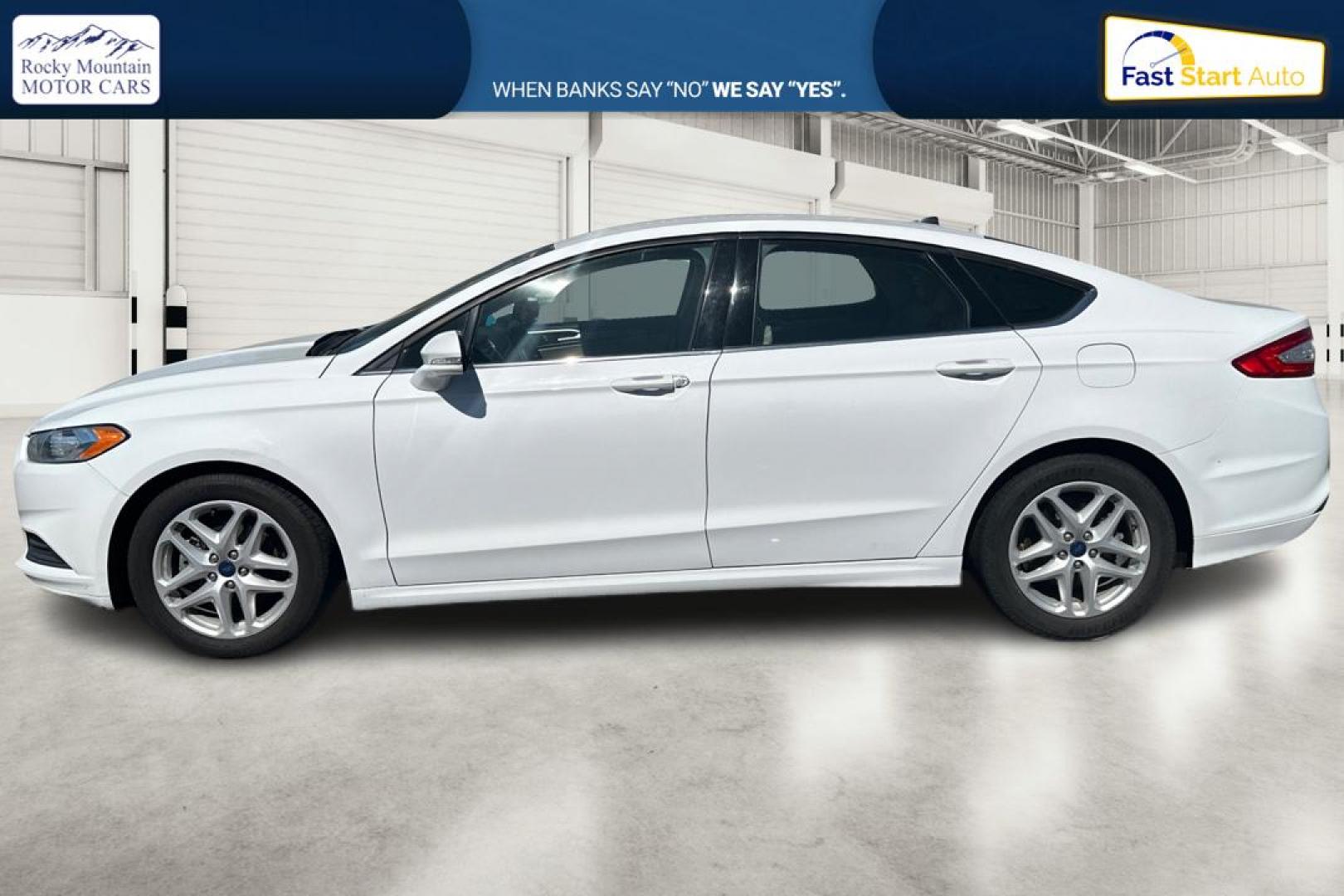 2015 White Ford Fusion SE (3FA6P0H71FR) with an 2.5L L4 DOHC 16V engine, Auto, 6-Spd w/SelShft transmission, located at 7755 State Street, Midvale, UT, 84047, (801) 753-9063, 40.610329, -111.892159 - Photo#6