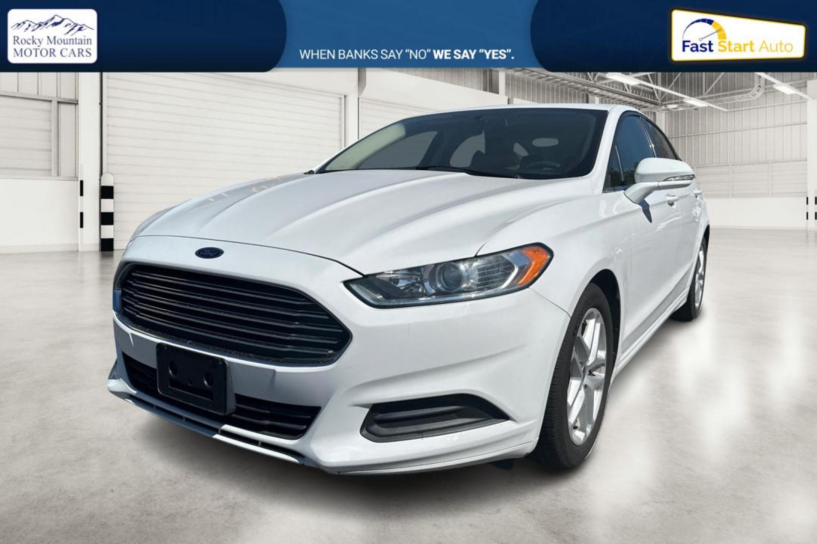 2015 White Ford Fusion SE (3FA6P0H71FR) with an 2.5L L4 DOHC 16V engine, Auto, 6-Spd w/SelShft transmission, located at 7755 State Street, Midvale, UT, 84047, (801) 753-9063, 40.610329, -111.892159 - Photo#8