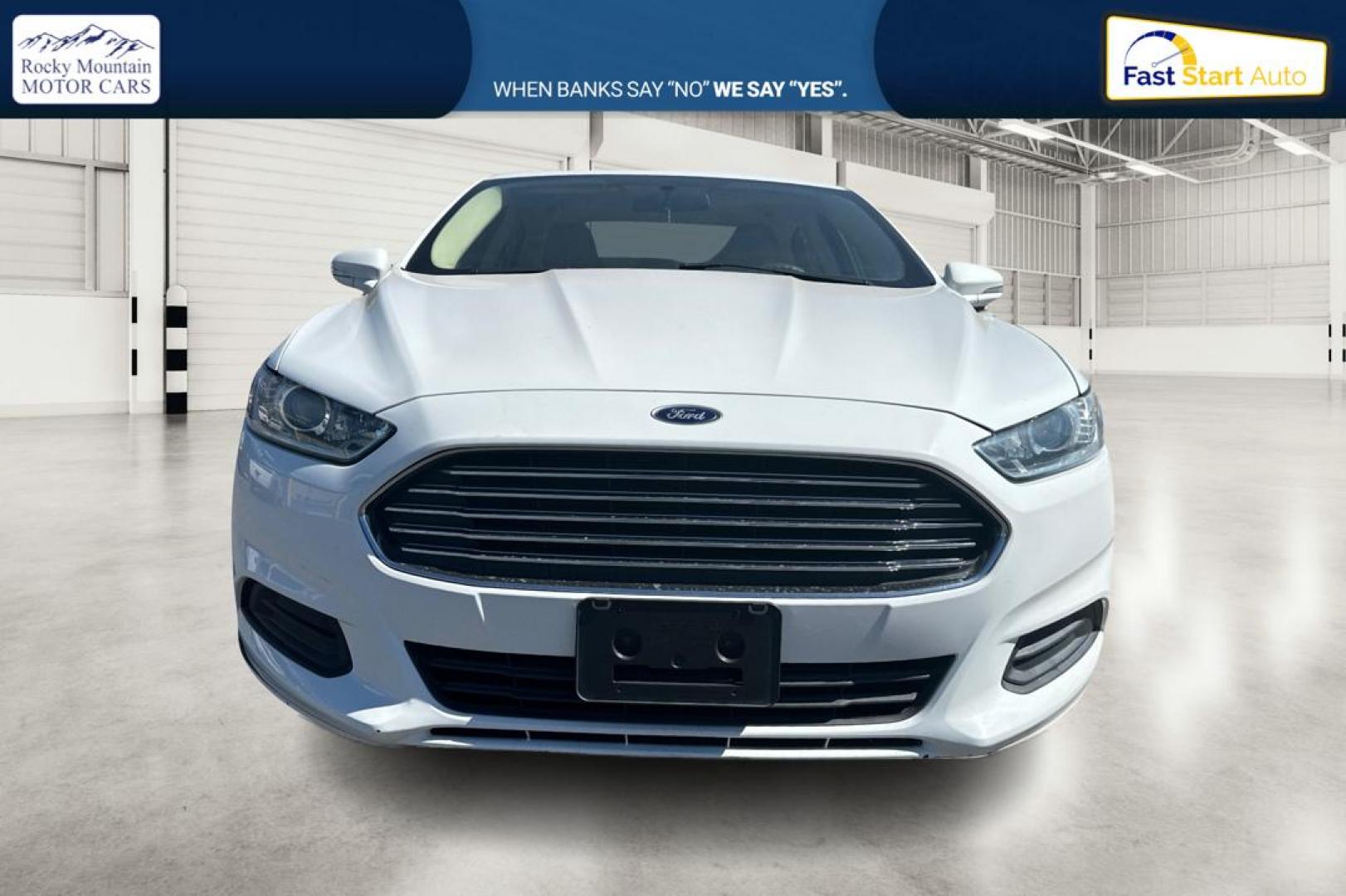 2015 White Ford Fusion SE (3FA6P0H71FR) with an 2.5L L4 DOHC 16V engine, Auto, 6-Spd w/SelShft transmission, located at 7755 State Street, Midvale, UT, 84047, (801) 753-9063, 40.610329, -111.892159 - Photo#9