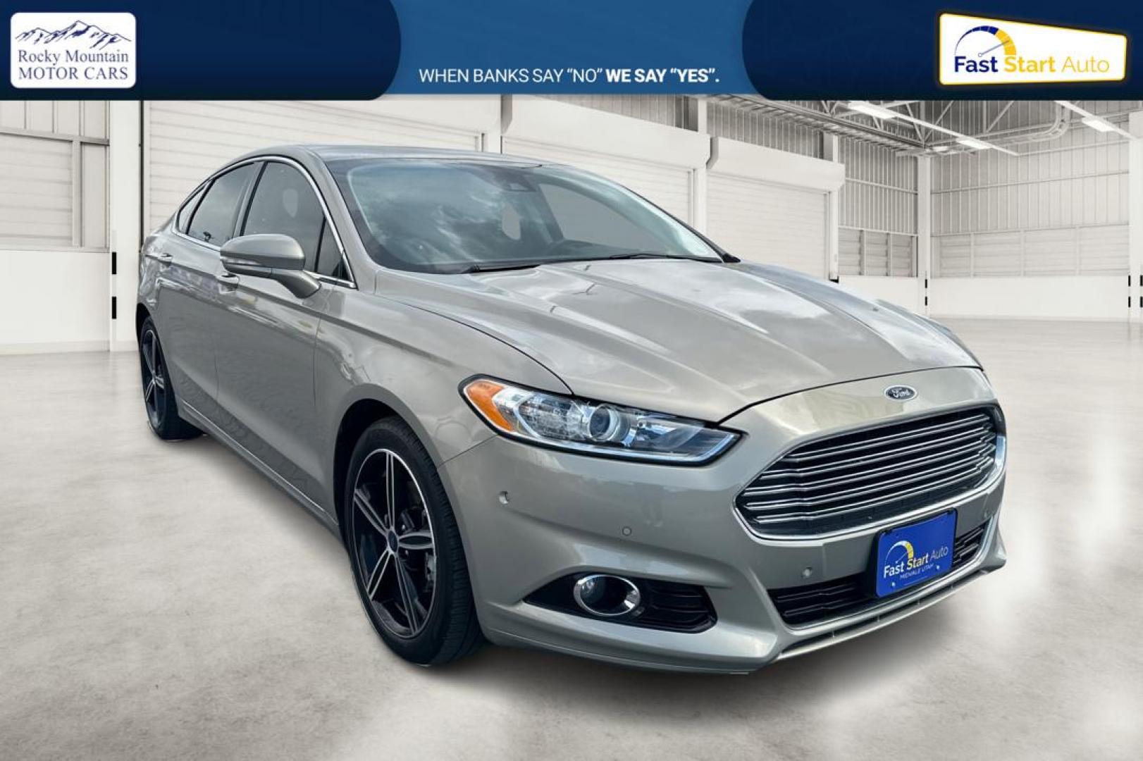 2015 Gray Ford Fusion Titanium (3FA6P0K93FR) with an 2.0L L4 DOHC 16V engine, Auto, 6-Spd w/SelShft transmission, located at 7755 State Street, Midvale, UT, 84047, (801) 753-9063, 40.610329, -111.892159 - Photo#0