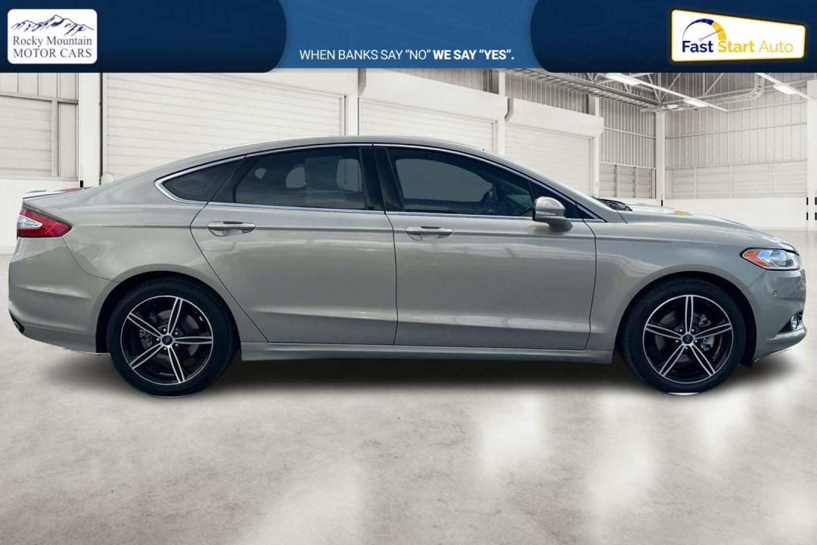 2015 Gray Ford Fusion Titanium (3FA6P0K93FR) with an 2.0L L4 DOHC 16V engine, Auto, 6-Spd w/SelShft transmission, located at 7755 State Street, Midvale, UT, 84047, (801) 753-9063, 40.610329, -111.892159 - Photo#1