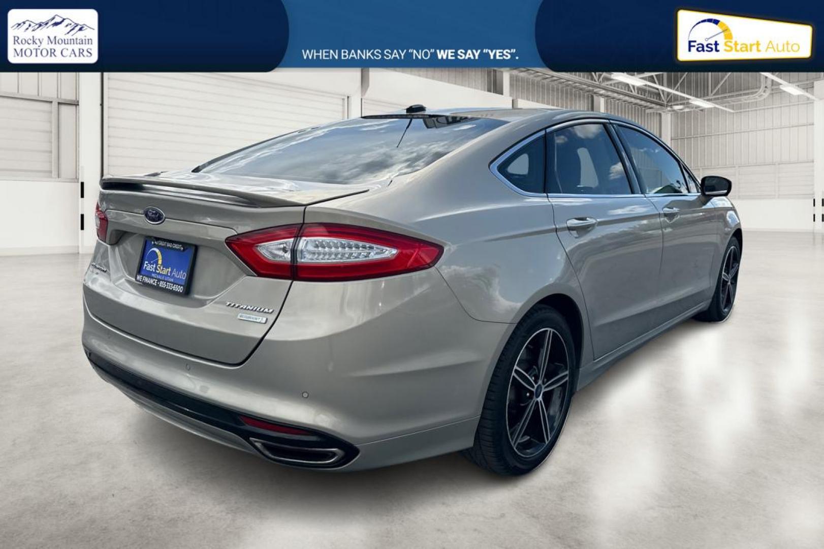 2015 Gray Ford Fusion Titanium (3FA6P0K93FR) with an 2.0L L4 DOHC 16V engine, Auto, 6-Spd w/SelShft transmission, located at 7755 State Street, Midvale, UT, 84047, (801) 753-9063, 40.610329, -111.892159 - Photo#2