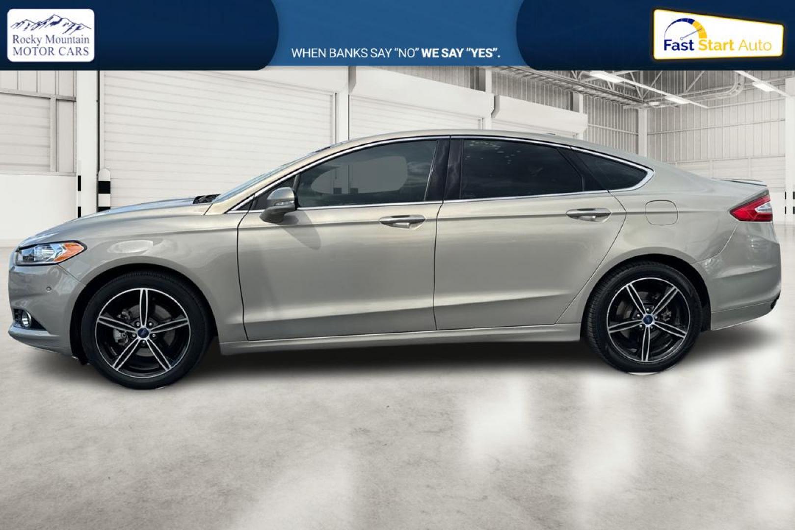 2015 Gray Ford Fusion Titanium (3FA6P0K93FR) with an 2.0L L4 DOHC 16V engine, Auto, 6-Spd w/SelShft transmission, located at 7755 State Street, Midvale, UT, 84047, (801) 753-9063, 40.610329, -111.892159 - Photo#6