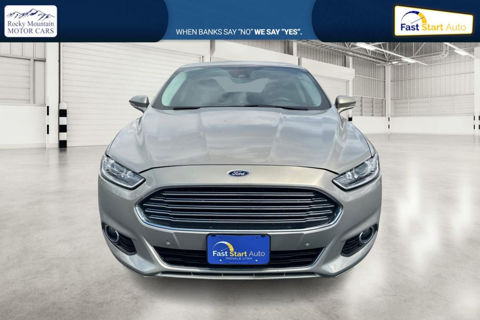 2015 Gray Ford Fusion Titanium (3FA6P0K93FR) with an 2.0L L4 DOHC 16V engine, Auto, 6-Spd w/SelShft transmission, located at 7755 State Street, Midvale, UT, 84047, (801) 753-9063, 40.610329, -111.892159 - Photo#9