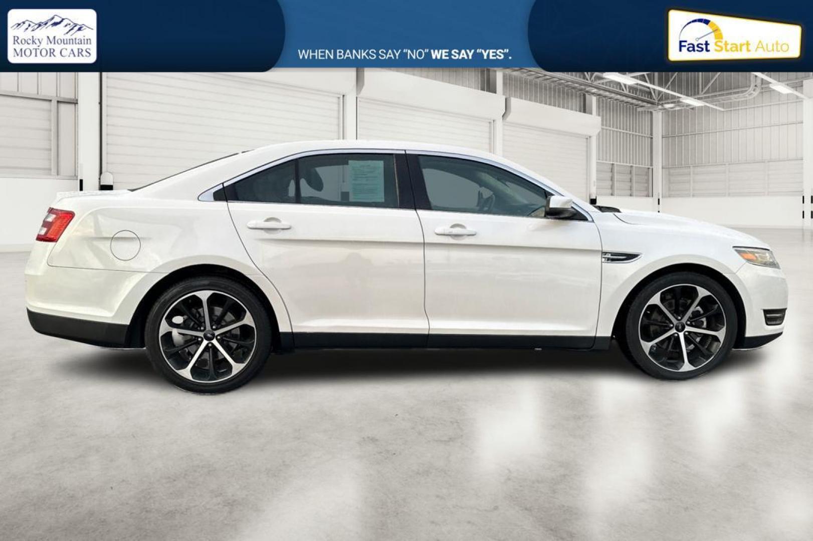 2015 White Ford Taurus SEL FWD (1FAHP2E87FG) with an 3.5L V6 DOHC 24V engine, 6-Speed Automatic transmission, located at 767 S State Road, Pleasant Grove, UT, 84062, (801) 785-1058, 40.354839, -111.736687 - Photo#1