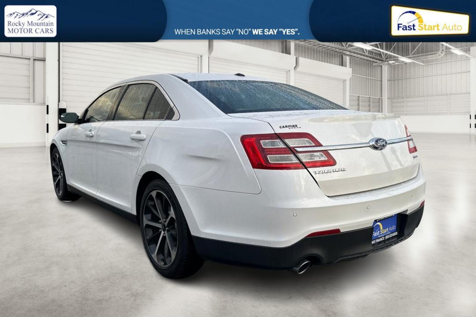 2015 White Ford Taurus SEL FWD (1FAHP2E87FG) with an 3.5L V6 DOHC 24V engine, 6-Speed Automatic transmission, located at 767 S State Road, Pleasant Grove, UT, 84062, (801) 785-1058, 40.354839, -111.736687 - Photo#5