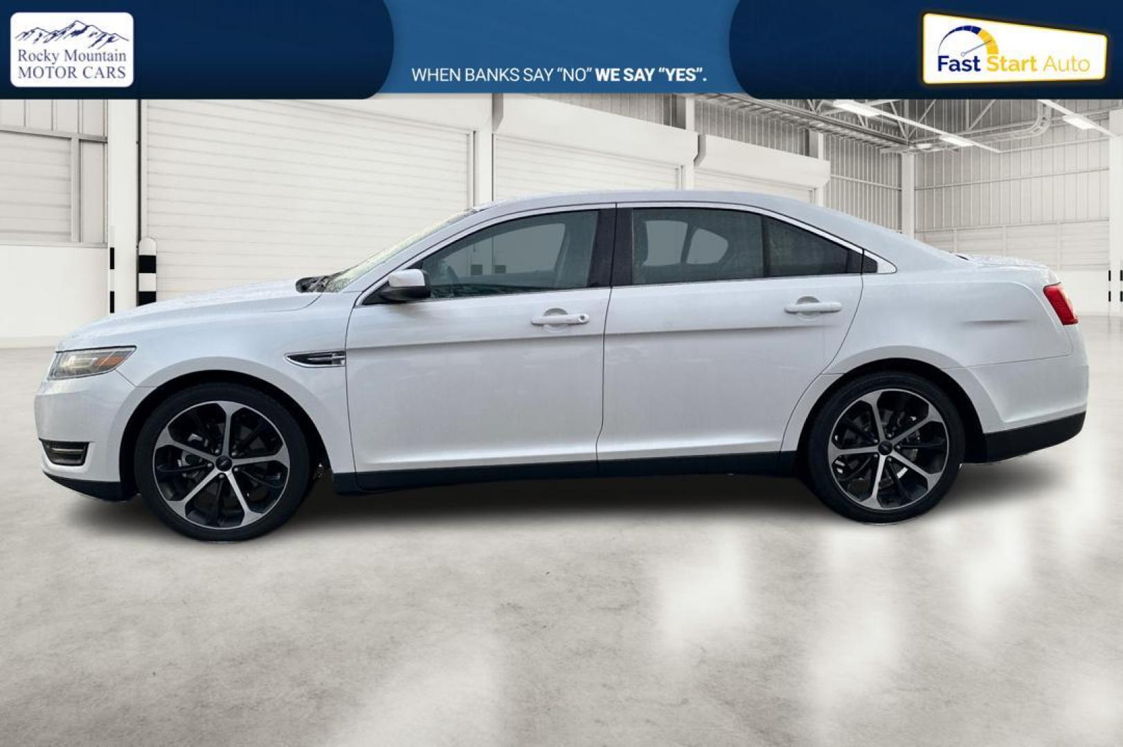 2015 White Ford Taurus SEL FWD (1FAHP2E87FG) with an 3.5L V6 DOHC 24V engine, 6-Speed Automatic transmission, located at 767 S State Road, Pleasant Grove, UT, 84062, (801) 785-1058, 40.354839, -111.736687 - Photo#6