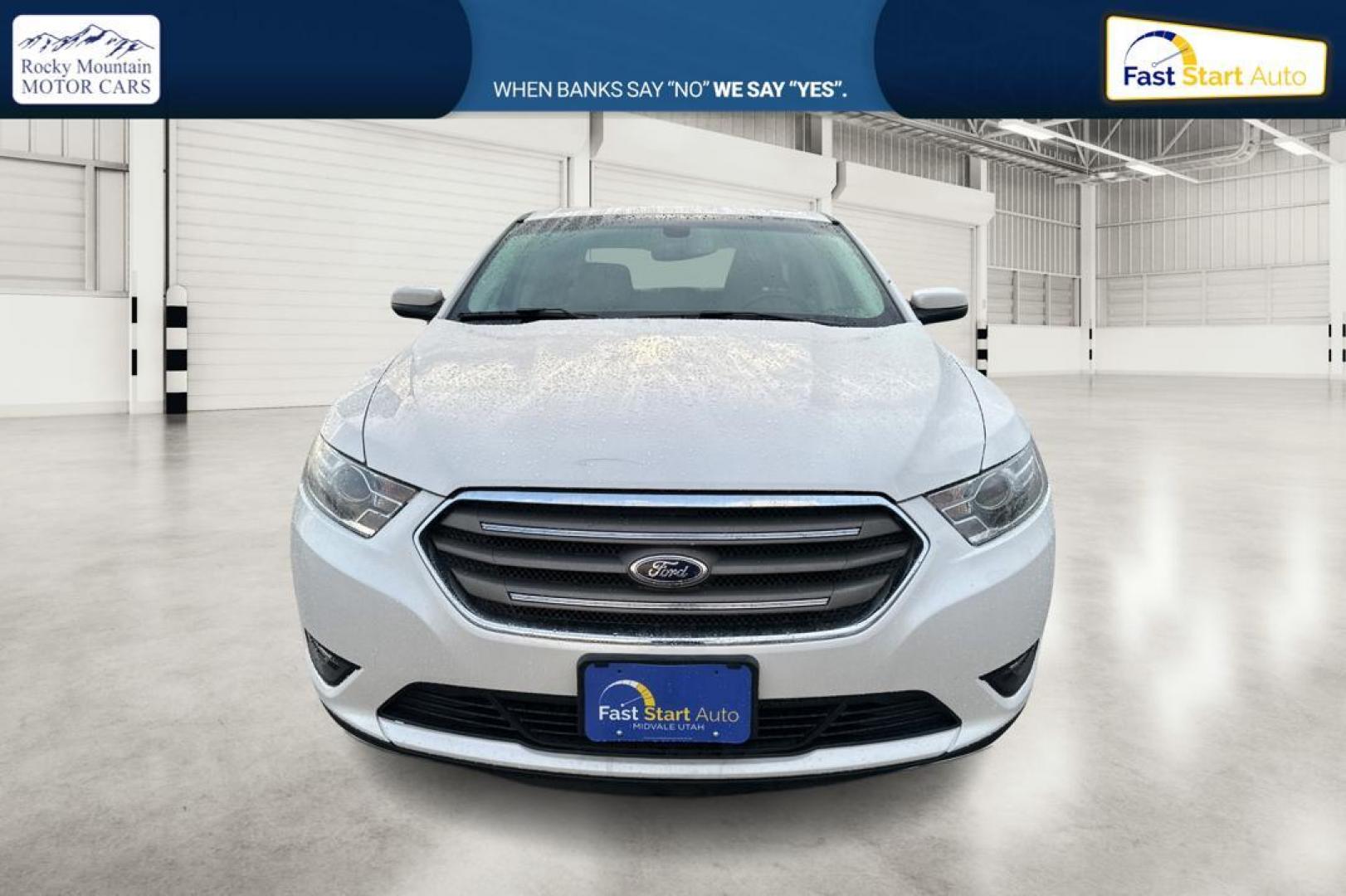 2015 White Ford Taurus SEL FWD (1FAHP2E87FG) with an 3.5L V6 DOHC 24V engine, 6-Speed Automatic transmission, located at 767 S State Road, Pleasant Grove, UT, 84062, (801) 785-1058, 40.354839, -111.736687 - Photo#9