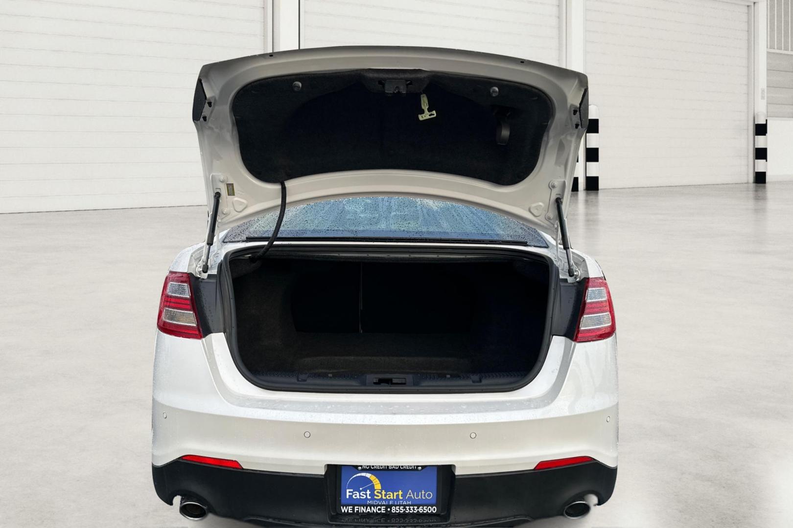 2015 White Ford Taurus SEL FWD (1FAHP2E87FG) with an 3.5L V6 DOHC 24V engine, 6-Speed Automatic transmission, located at 767 S State Road, Pleasant Grove, UT, 84062, (801) 785-1058, 40.354839, -111.736687 - Photo#13