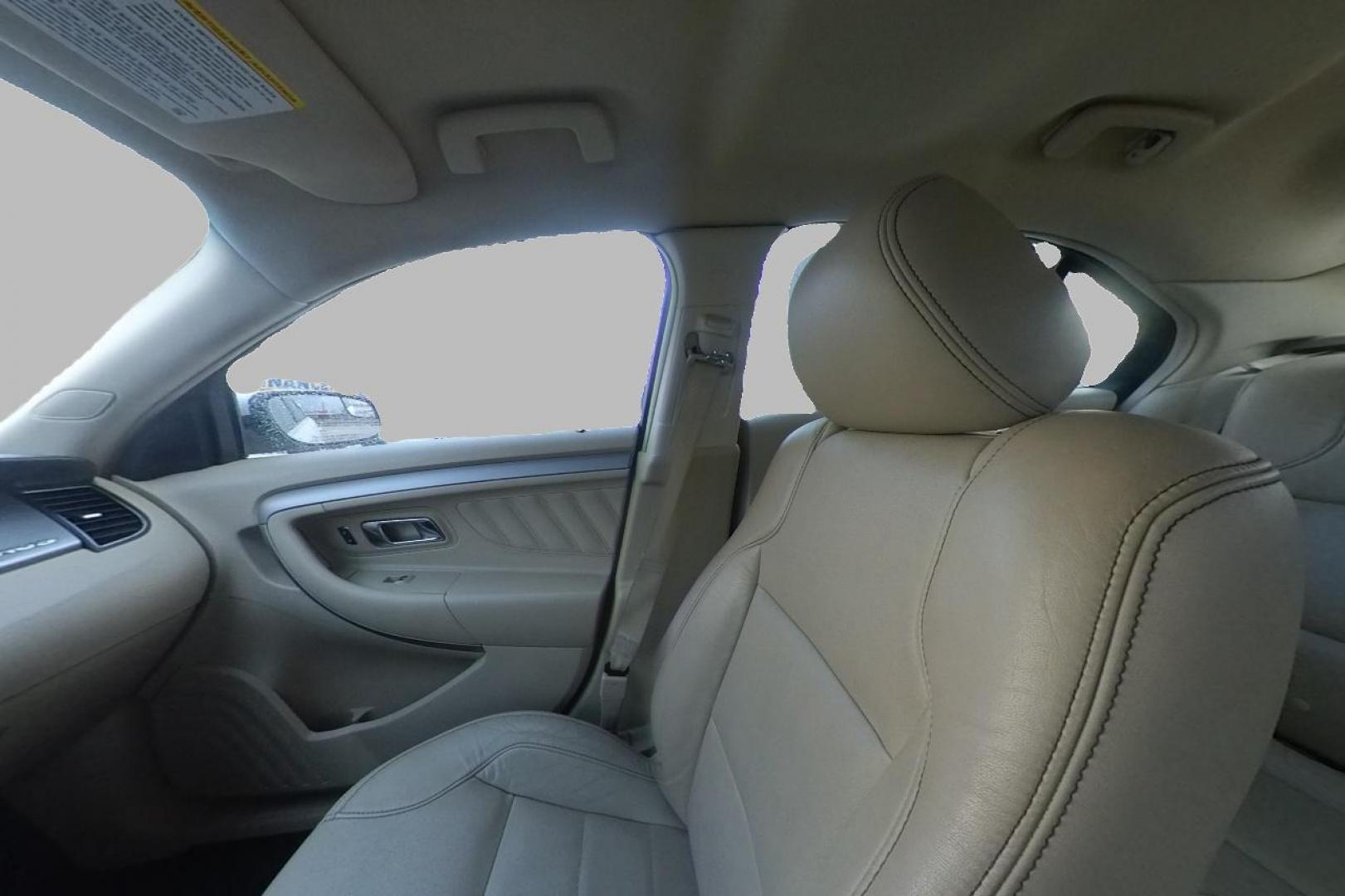 2015 White Ford Taurus SEL FWD (1FAHP2E87FG) with an 3.5L V6 DOHC 24V engine, 6-Speed Automatic transmission, located at 767 S State Road, Pleasant Grove, UT, 84062, (801) 785-1058, 40.354839, -111.736687 - Photo#17