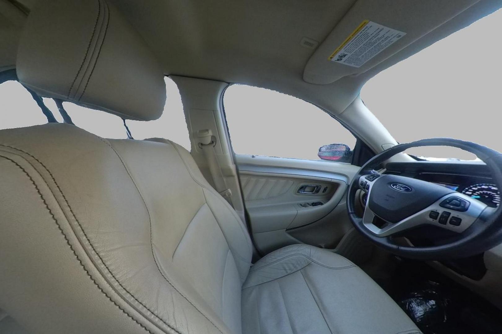 2015 White Ford Taurus SEL FWD (1FAHP2E87FG) with an 3.5L V6 DOHC 24V engine, 6-Speed Automatic transmission, located at 767 S State Road, Pleasant Grove, UT, 84062, (801) 785-1058, 40.354839, -111.736687 - Photo#19