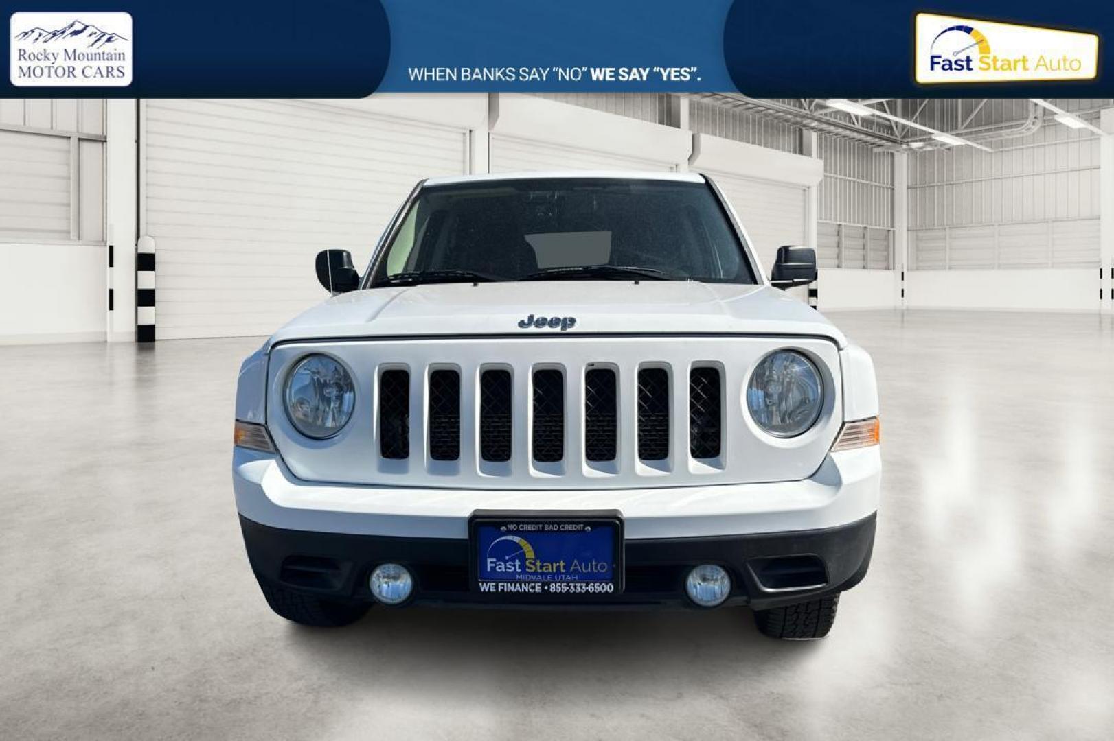 2015 White Jeep Patriot Sport 4WD (1C4NJRBB1FD) with an 2.4L L4 DOHC 16V engine, Automatic, CVT transmission, located at 7755 State Street, Midvale, UT, 84047, (801) 753-9063, 40.610329, -111.892159 - Photo#9