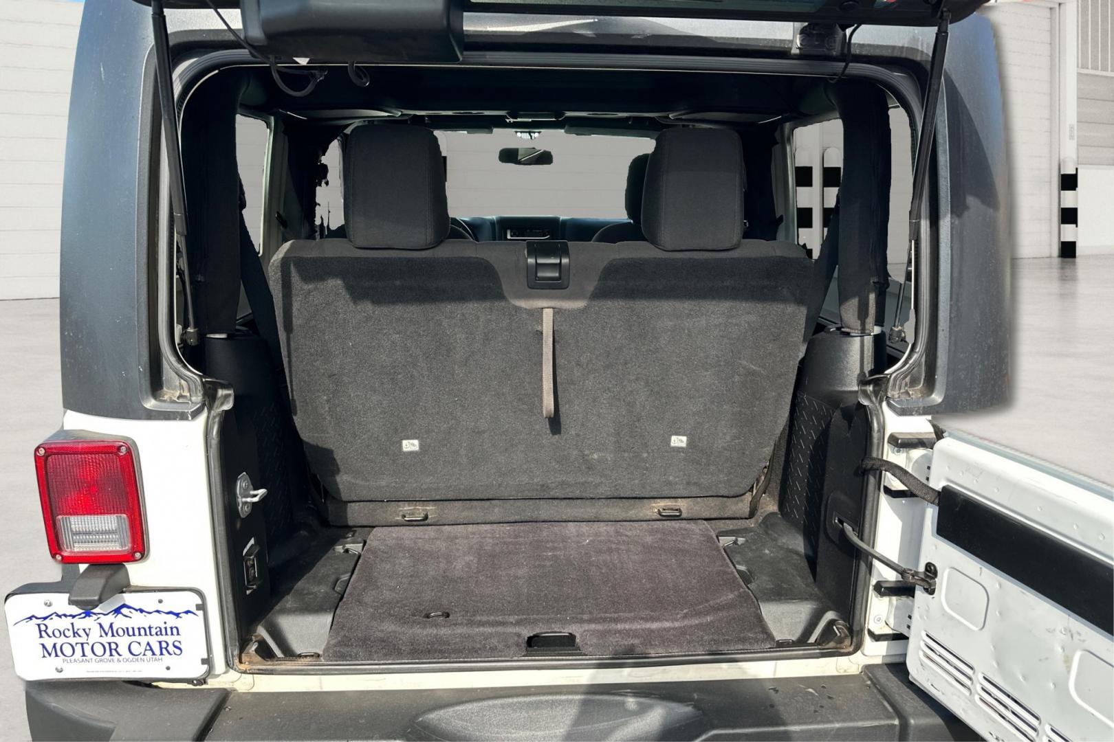 2015 White Jeep Wrangler Sport 4WD (1C4AJWAG2FL) with an 3.6L V6 DOHC 24V FFV engine, Automatic, 5-Spd transmission, located at 767 S State Road, Pleasant Grove, UT, 84062, (801) 785-1058, 40.354839, -111.736687 - Photo#10