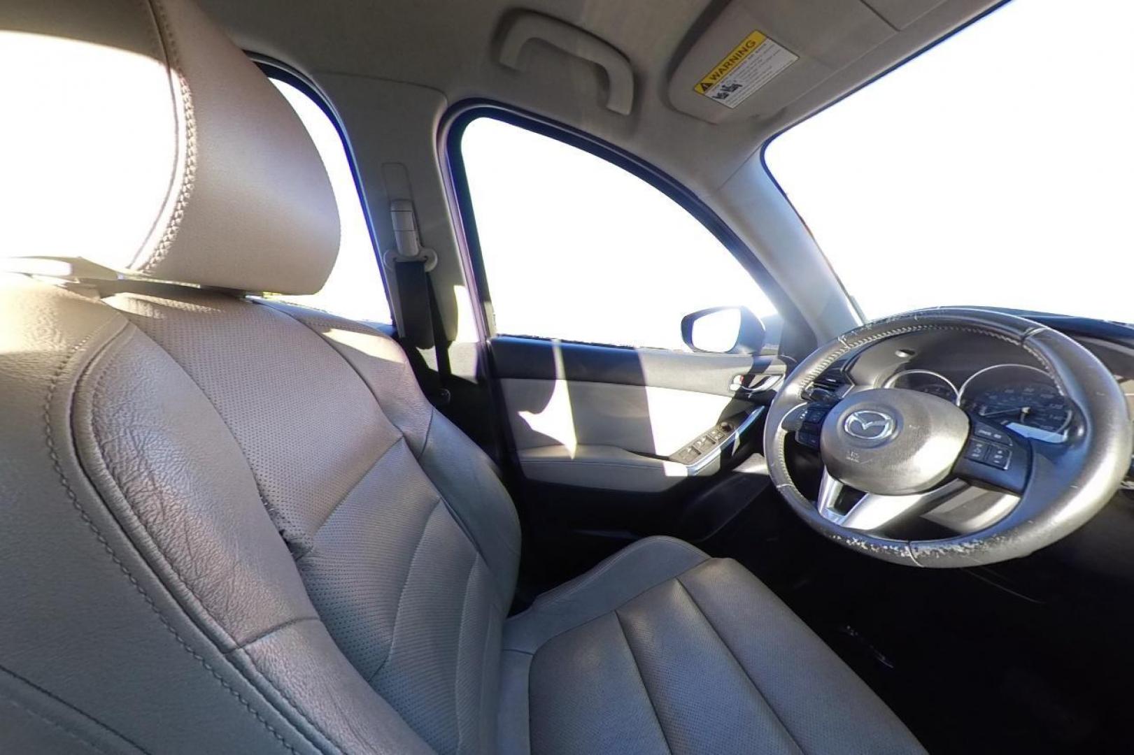 2015 Blue Mazda CX-5 Grand Touring (JM3KE2DY5F0) with an 2.5L L4 DOHC 16V engine, 6-Speed Automatic transmission, located at 7755 State Street, Midvale, UT, 84047, (801) 753-9063, 40.610329, -111.892159 - Photo#17