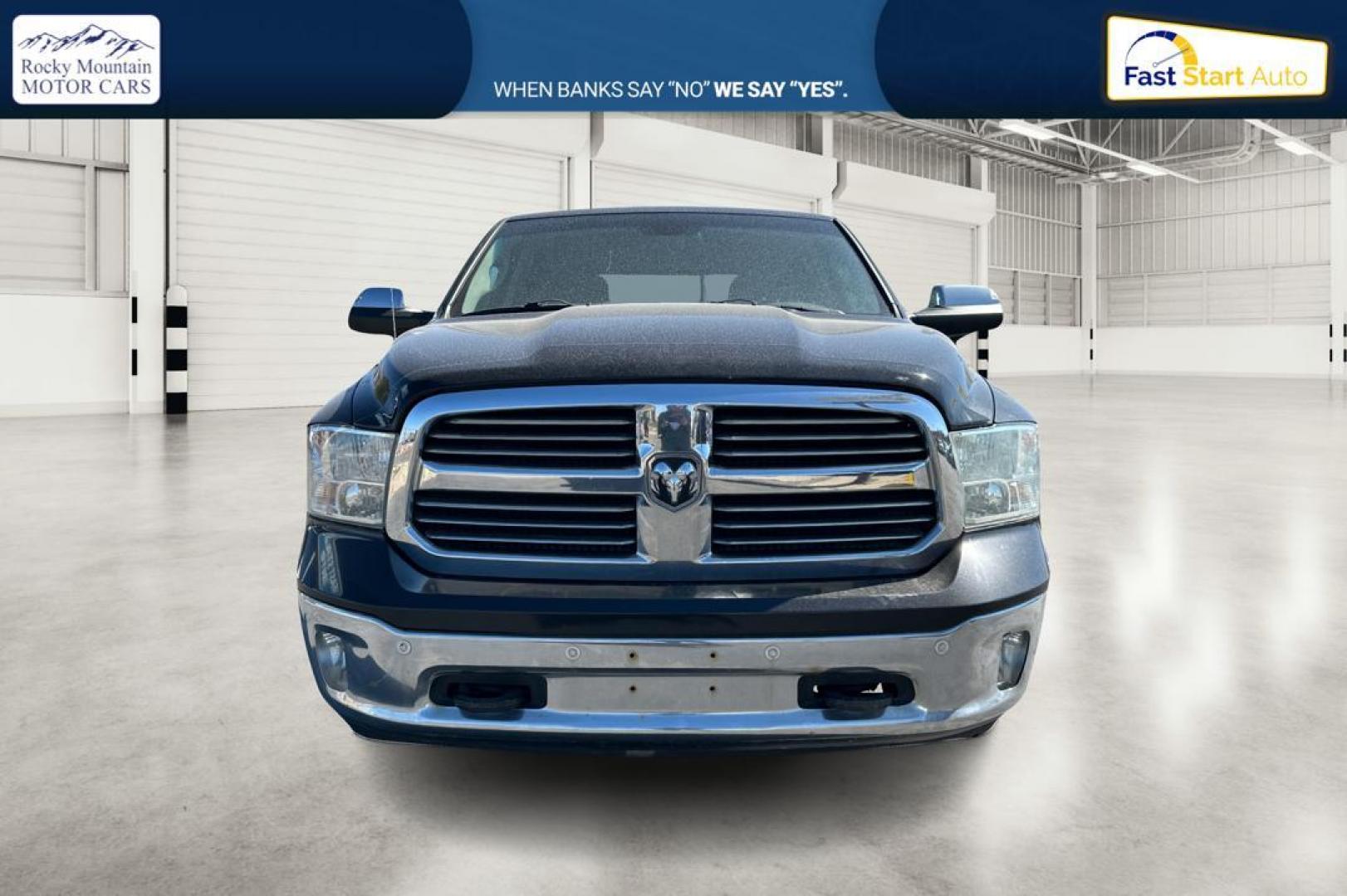 2015 Black RAM 1500 SLT Crew Cab LWB 4WD (1C6RR7TT6FS) with an 5.7L V8 OHV 16V engine, 6-Speed Automatic transmission, located at 7755 State Street, Midvale, UT, 84047, (801) 753-9063, 40.610329, -111.892159 - Photo#9