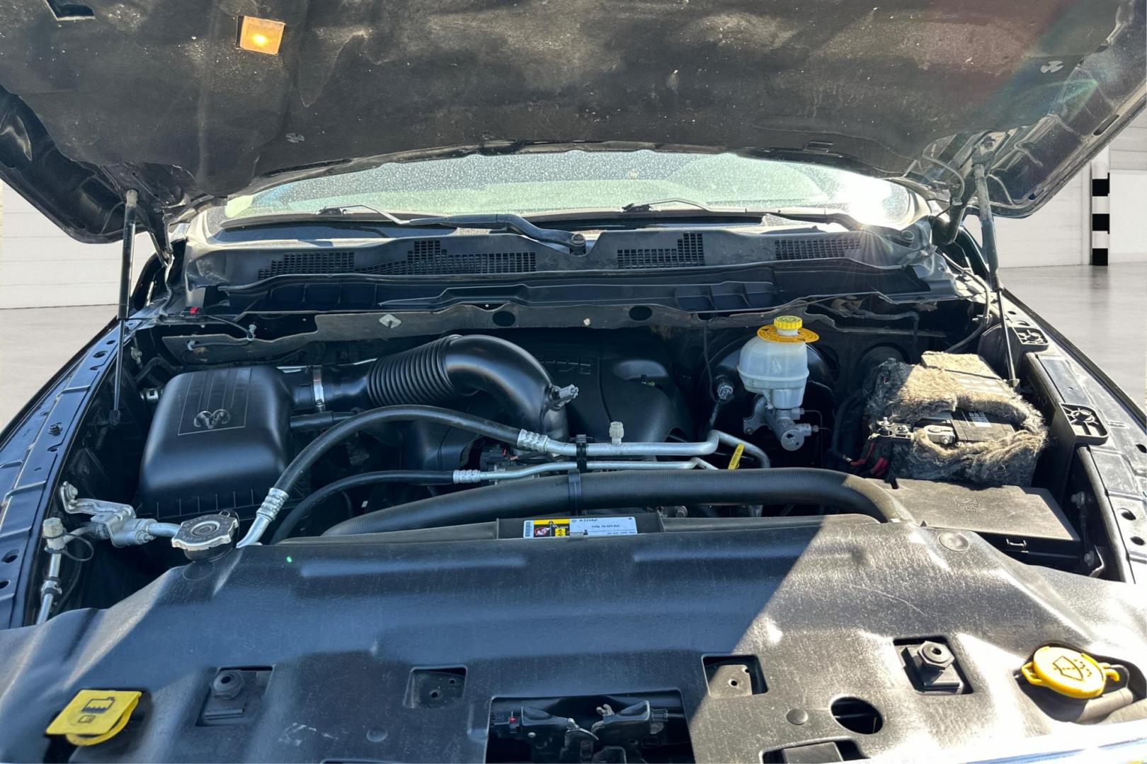2015 Black RAM 1500 SLT Crew Cab LWB 4WD (1C6RR7TT6FS) with an 5.7L V8 OHV 16V engine, 6-Speed Automatic transmission, located at 7755 State Street, Midvale, UT, 84047, (801) 753-9063, 40.610329, -111.892159 - Photo#10
