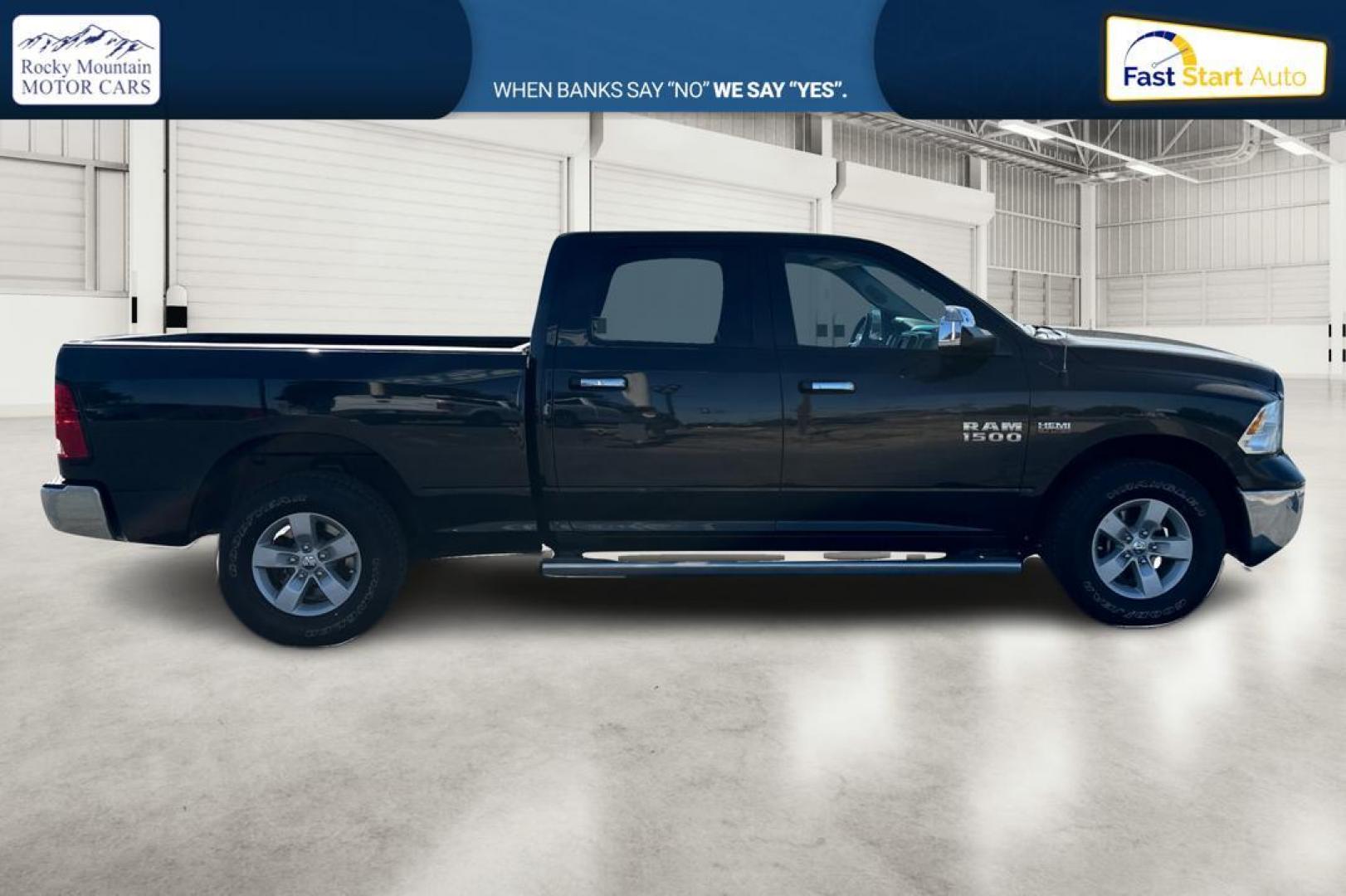 2015 Black RAM 1500 SLT Crew Cab LWB 4WD (1C6RR7TT6FS) with an 5.7L V8 OHV 16V engine, 6-Speed Automatic transmission, located at 7755 State Street, Midvale, UT, 84047, (801) 753-9063, 40.610329, -111.892159 - Photo#1