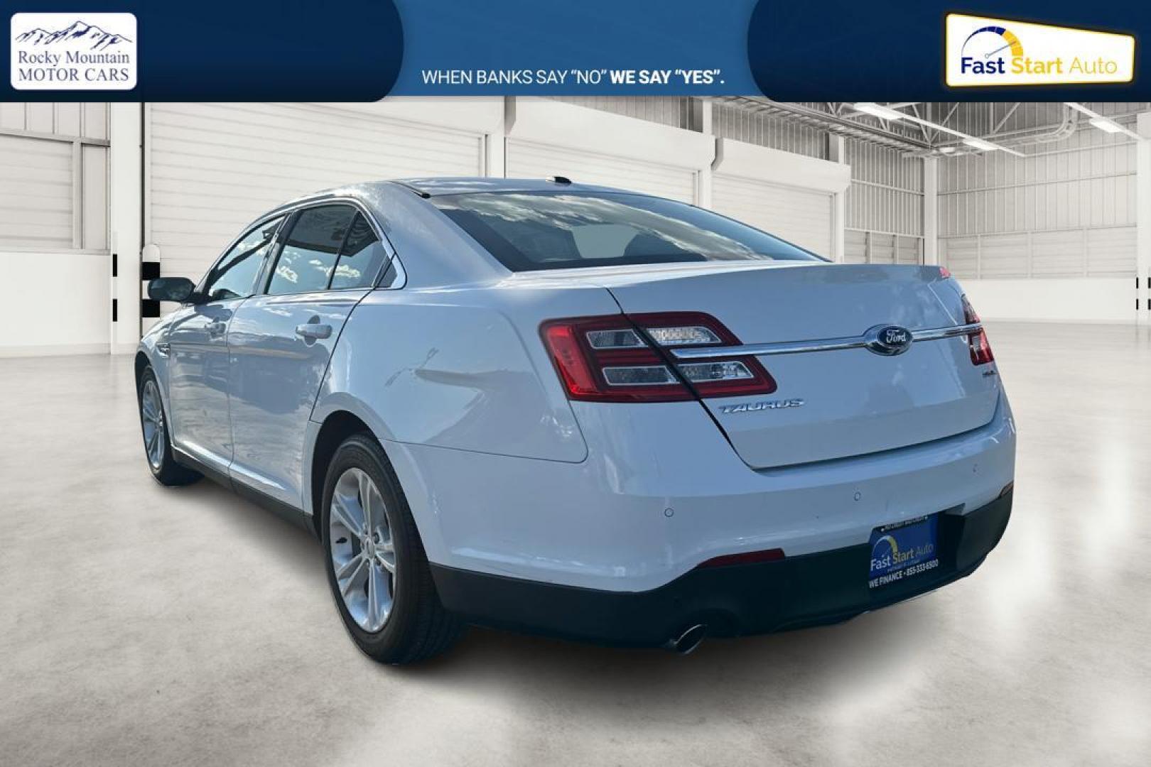 2016 White Ford Taurus SEL FWD (1FAHP2E83GG) with an 3.5L V6 DOHC 24V engine, 6A transmission, located at 7755 State Street, Midvale, UT, 84047, (801) 753-9063, 40.610329, -111.892159 - Photo#5