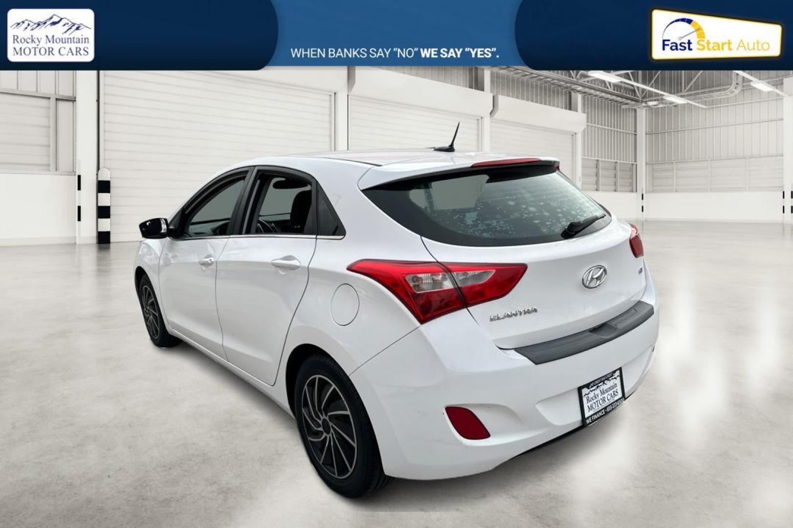 2016 White Hyundai Elantra GT A/T (KMHD35LH2GU) with an 2.0L L4 16V DOHC engine, 6A transmission, located at 767 S State Road, Pleasant Grove, UT, 84062, (801) 785-1058, 40.354839, -111.736687 - Photo#5
