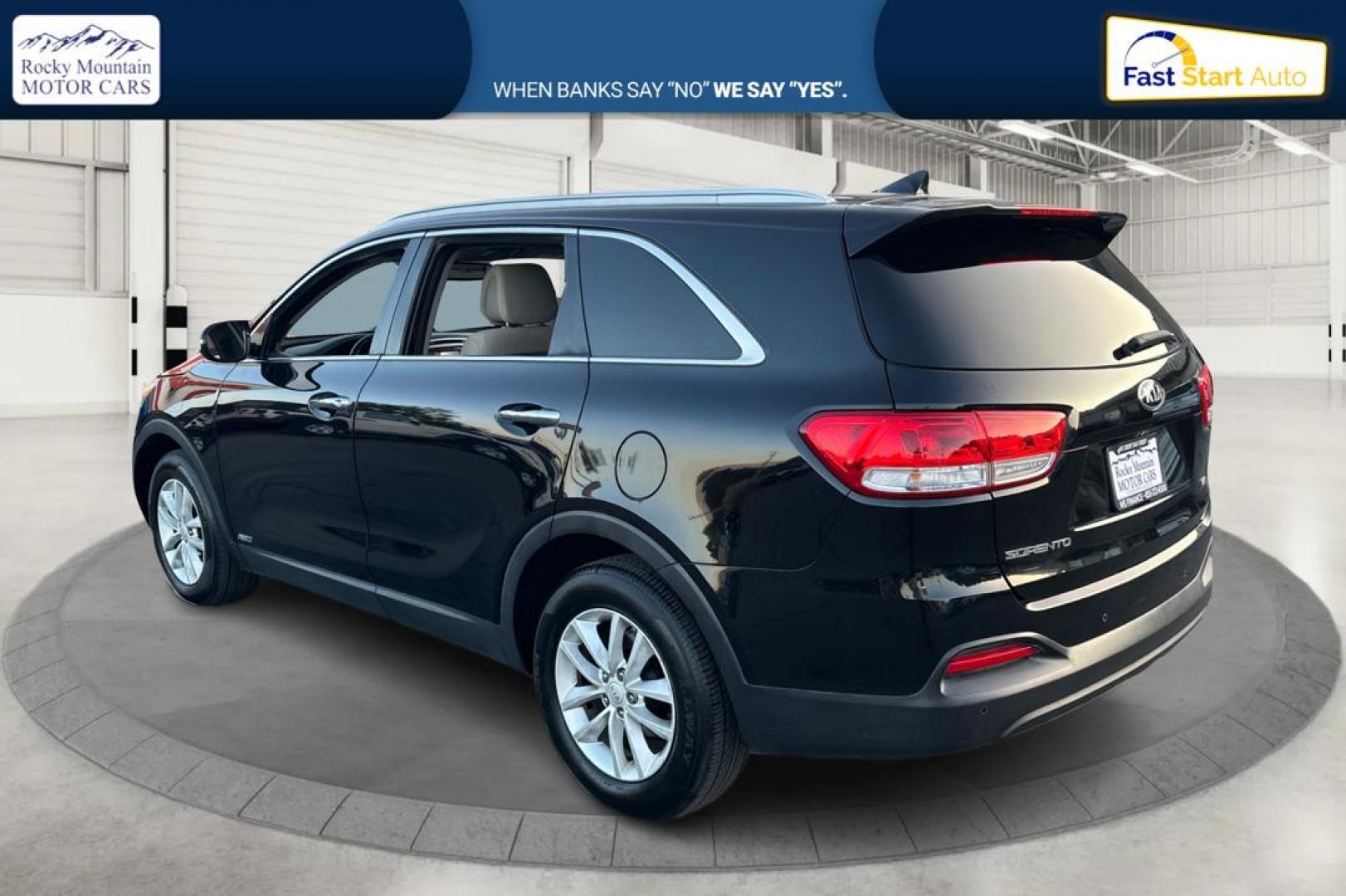 2016 Black Kia Sorento LX AWD (5XYPGDA38GG) with an 2.4L L4 DOHC 16V engine, 6-Speed Automatic transmission, located at 767 S State Road, Pleasant Grove, UT, 84062, (801) 785-1058, 40.354839, -111.736687 - Photo#4
